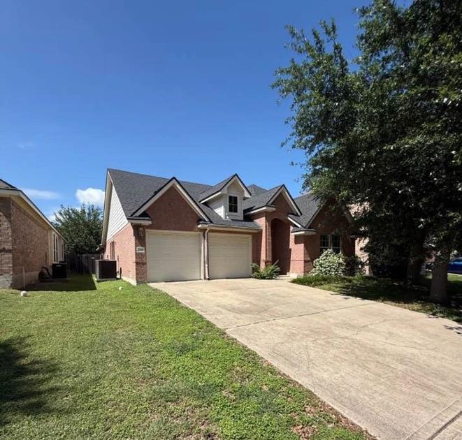 A classic brick exterior with a welcoming entrywa