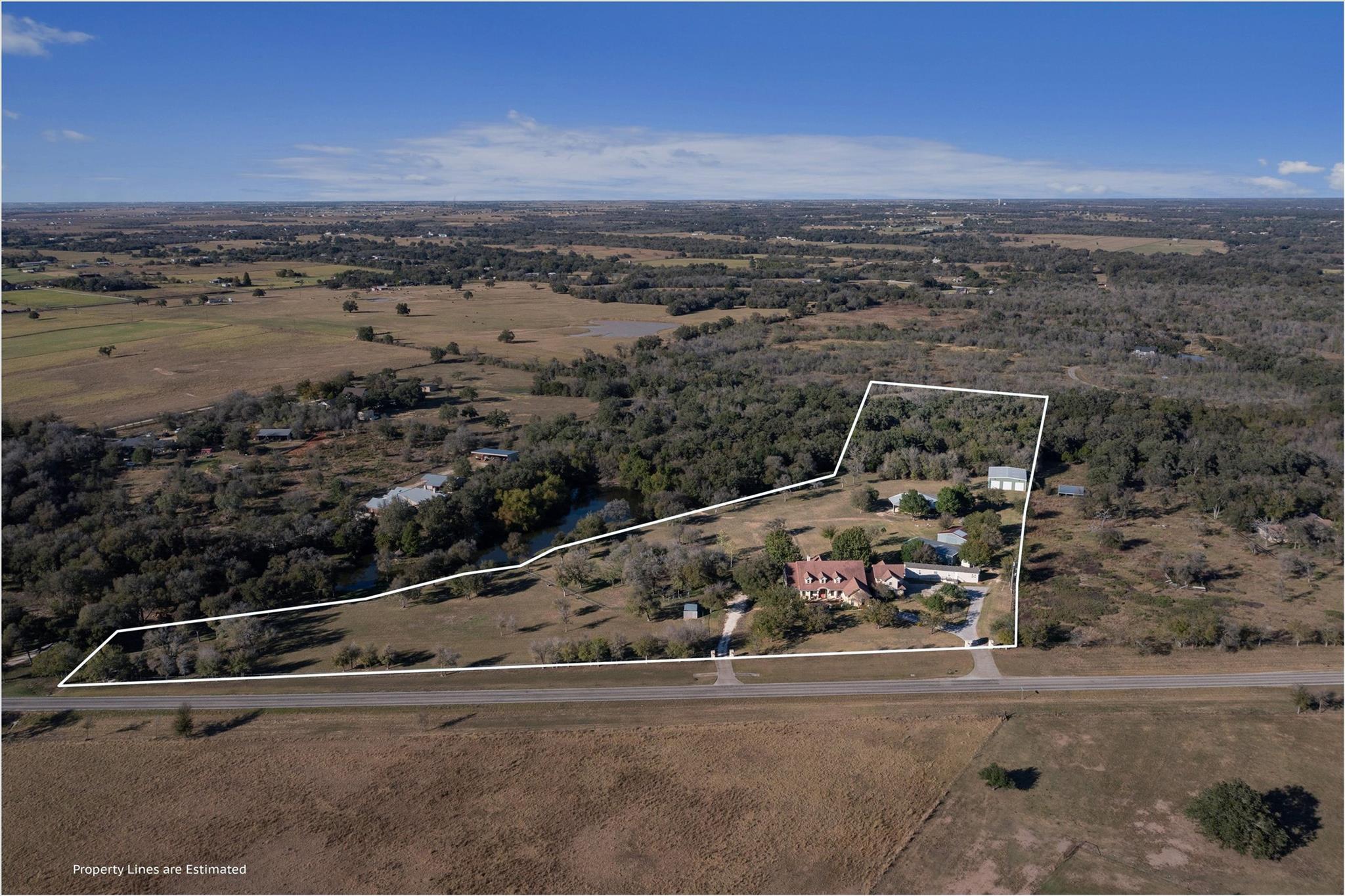 An aerial perspective reveals a vast estate, high