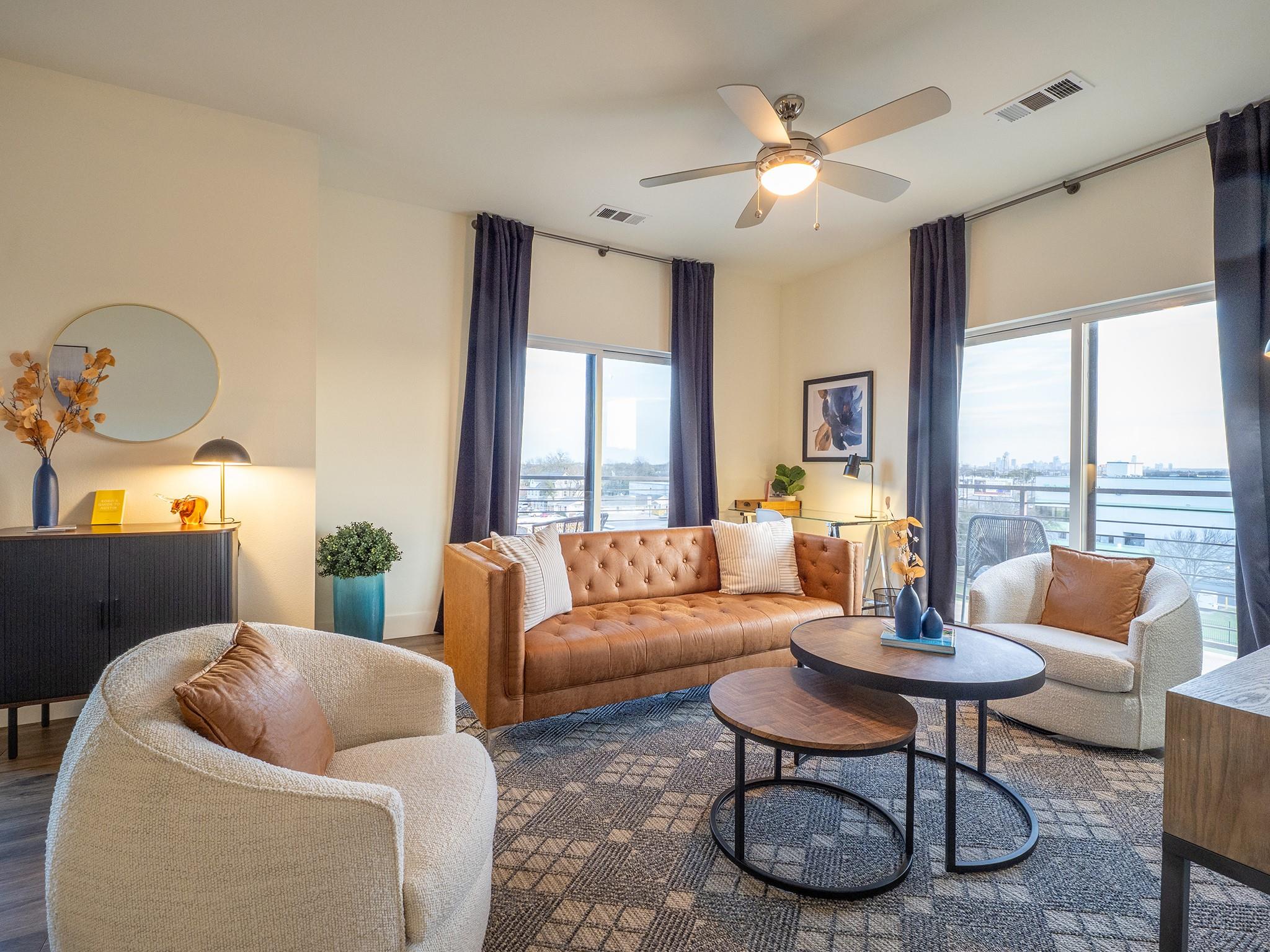 Floor-to-ceiling windows illuminate this inviting