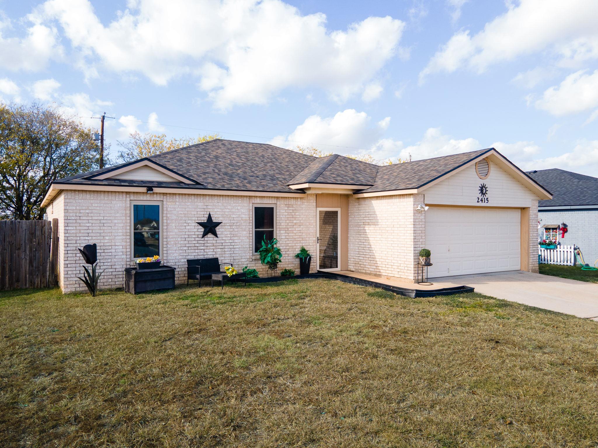 A well-maintained single-story home with a neat l