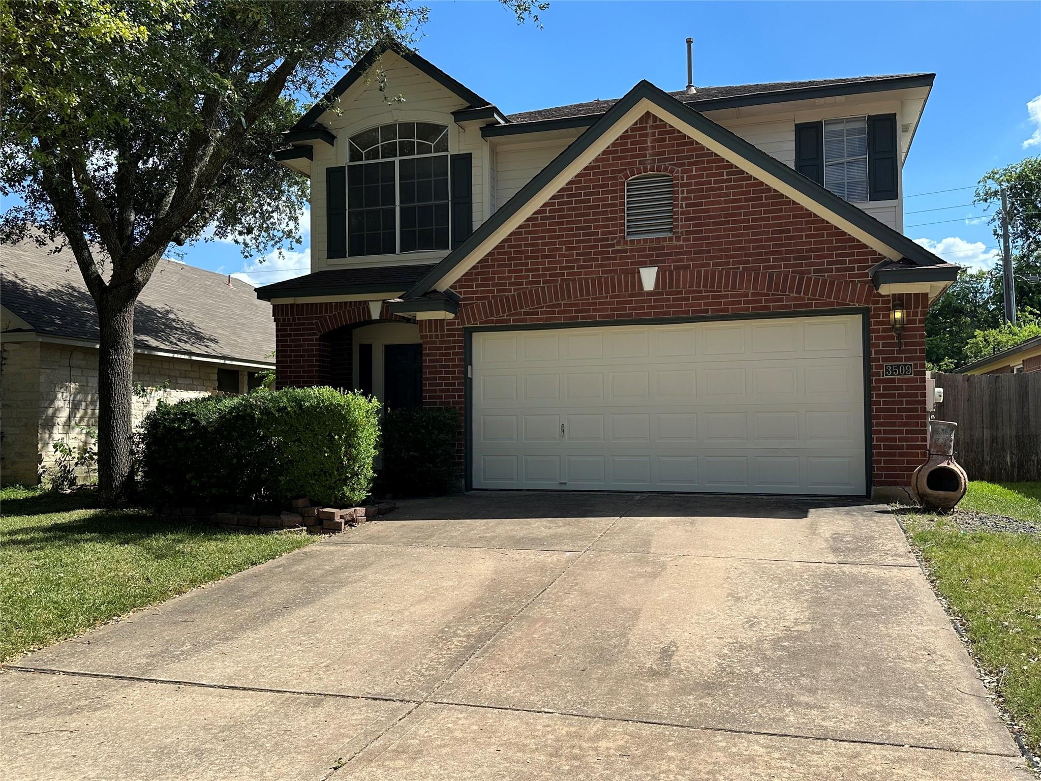 A classic brick and siding exterior welcomes you 