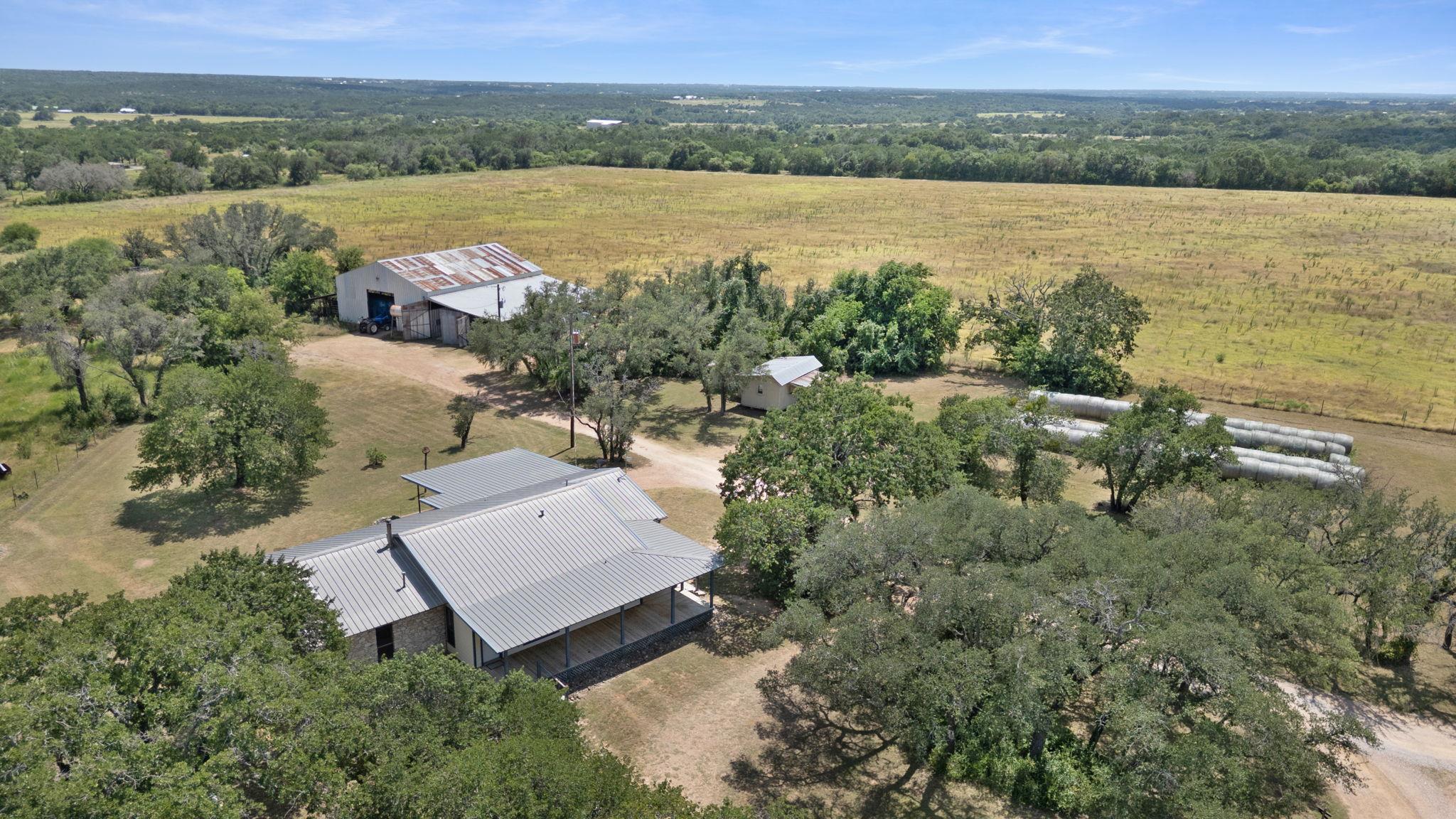 Rolling countryside views surround a charming hom
