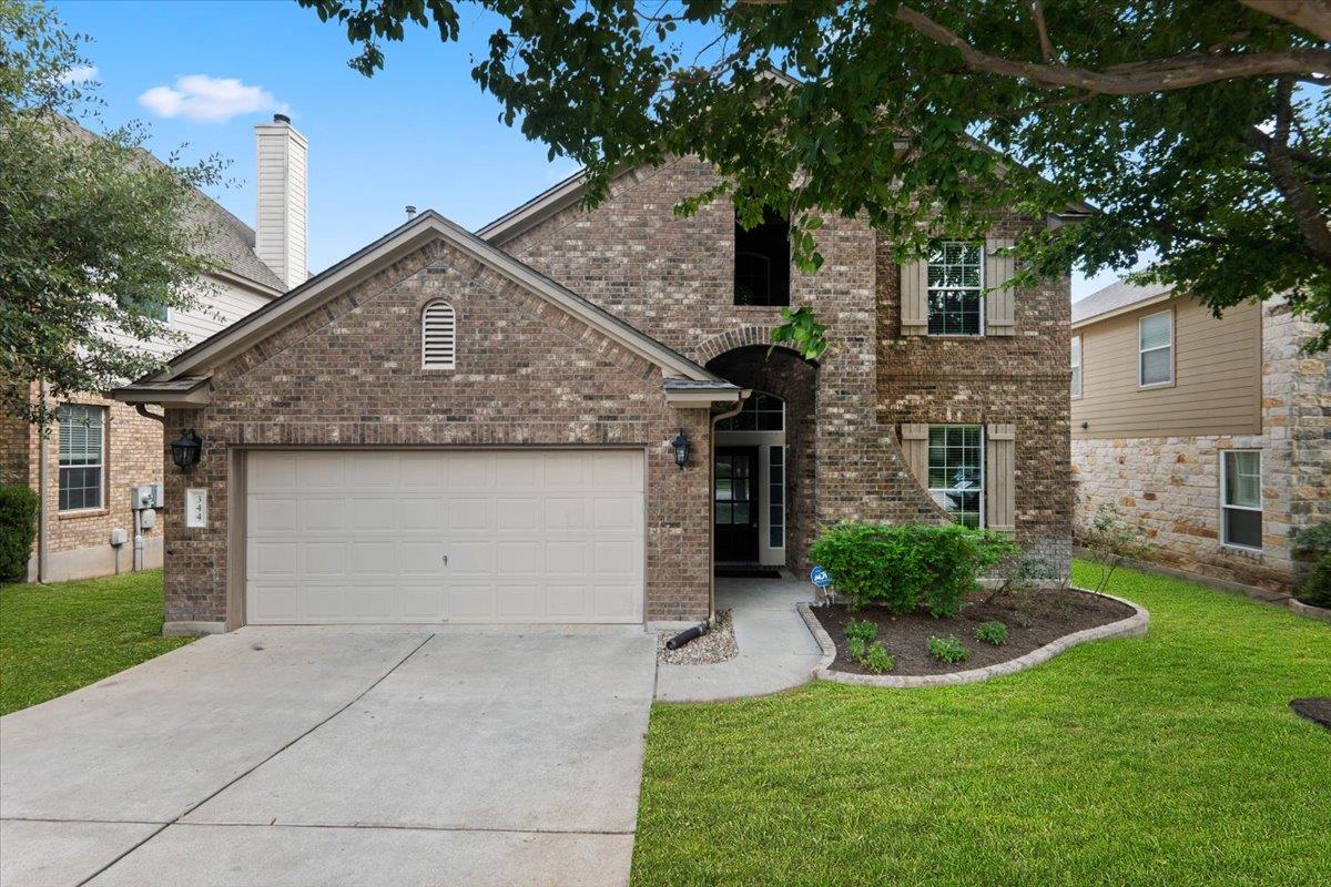 A classic brick exterior offers appealing curb ap