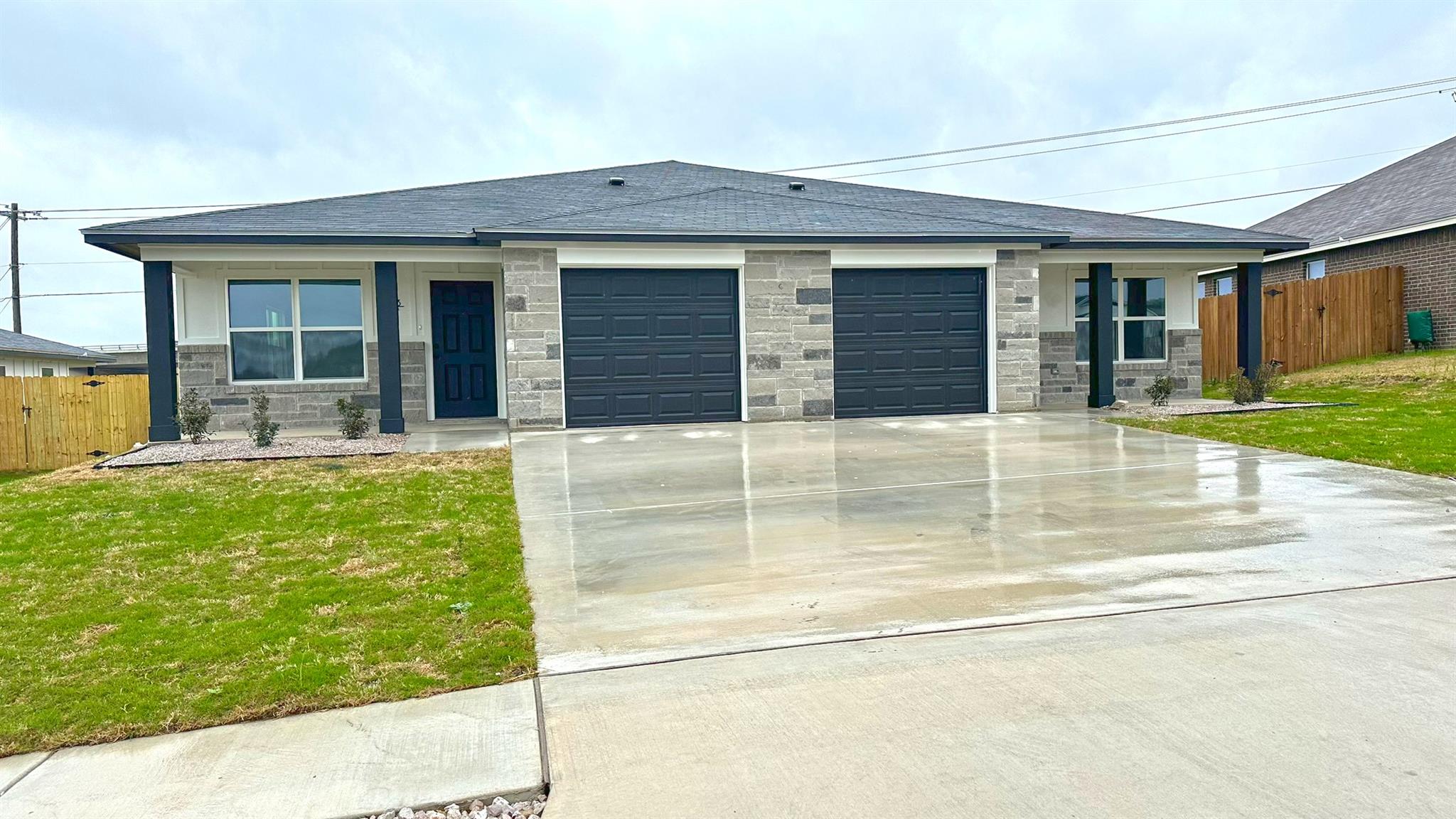 A well-maintained duplex presents inviting curb a