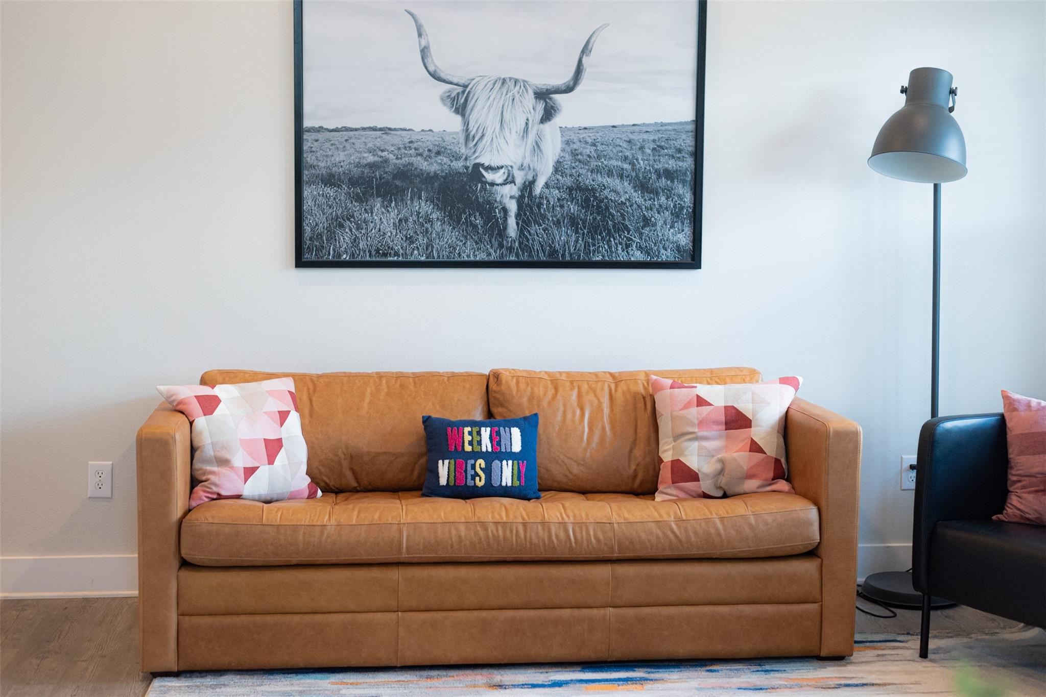 Hardwood-style flooring extends through this room