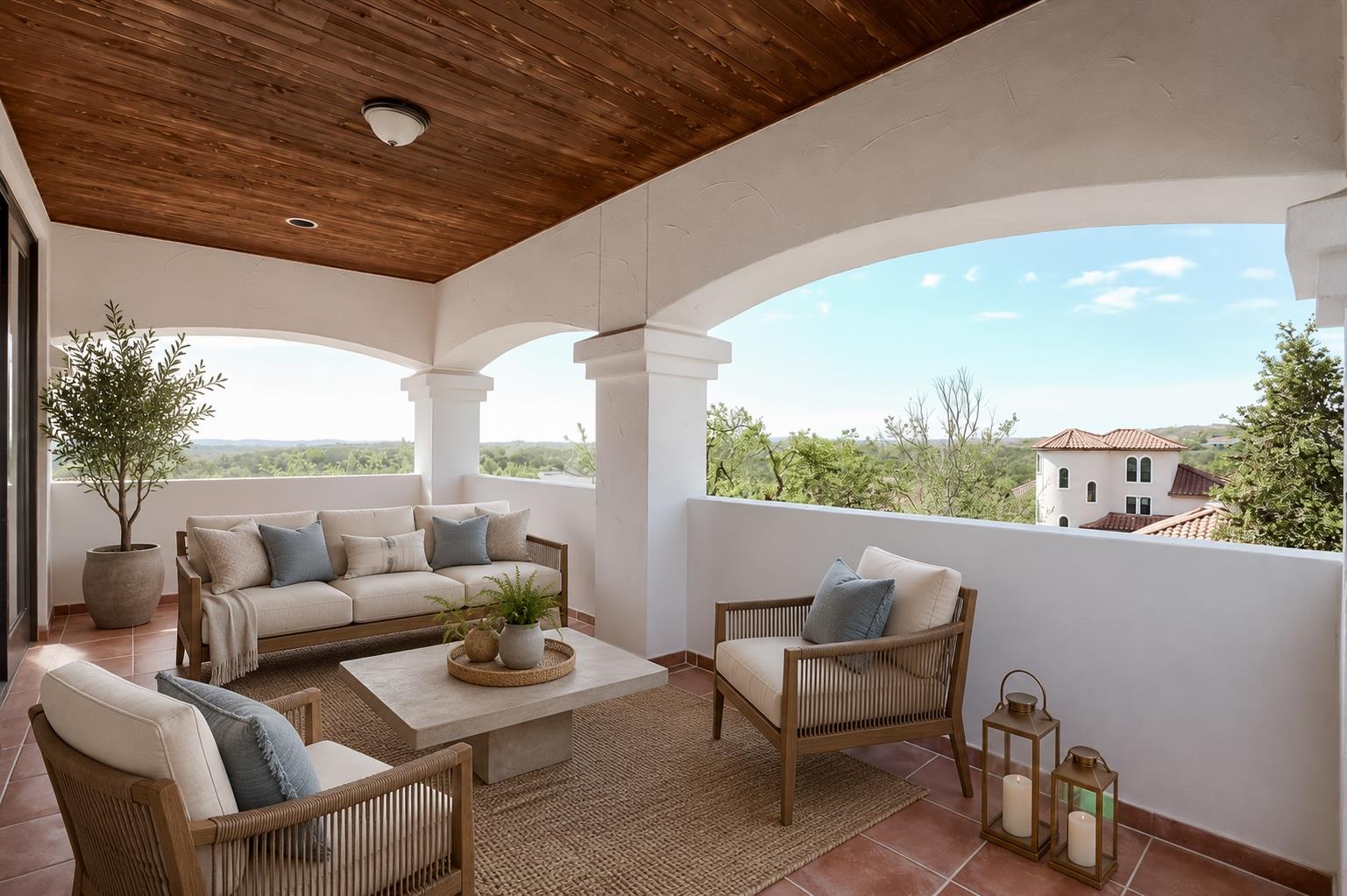 A spacious, tiled patio offers scenic outdoor liv