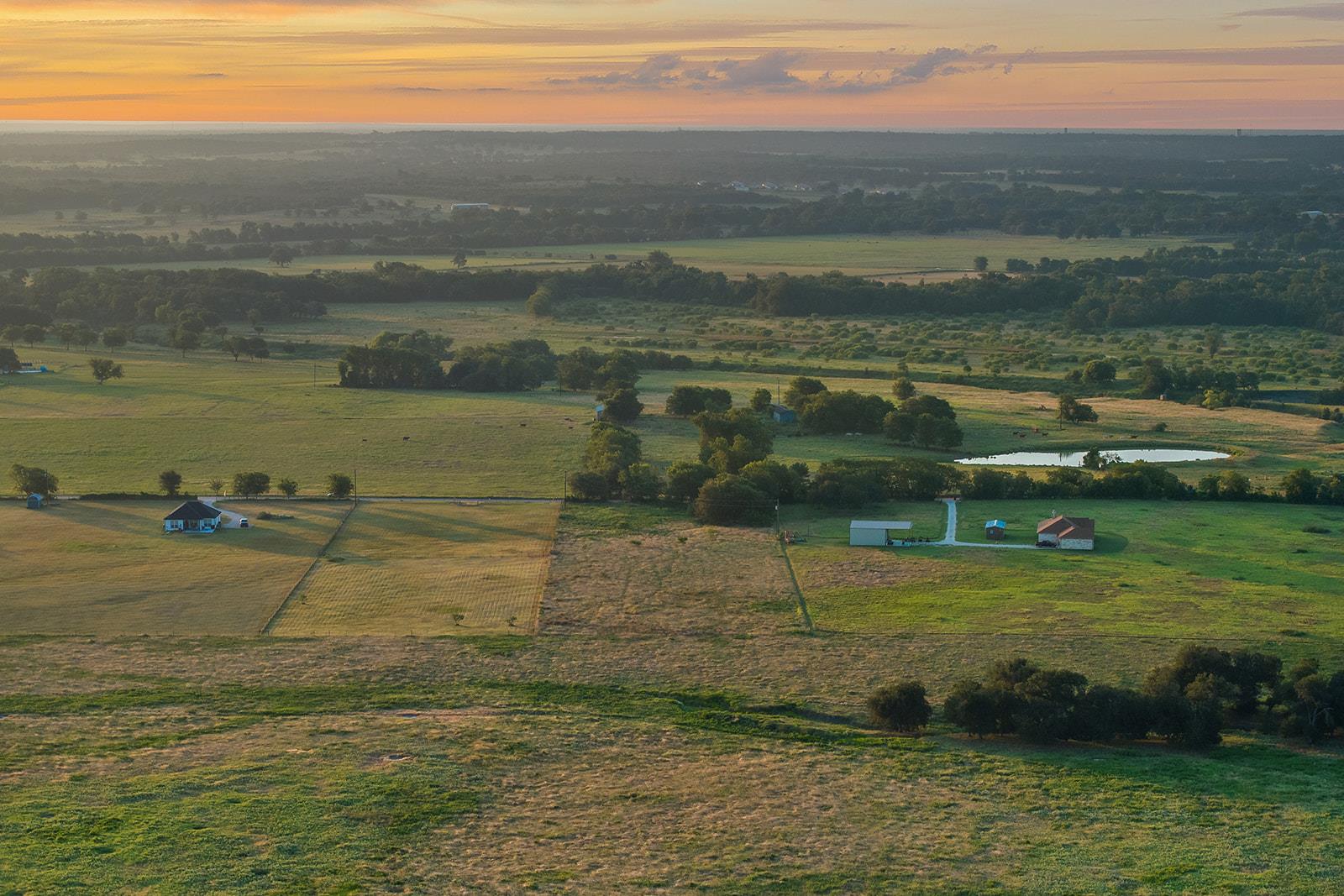 Golden hour illuminates this sprawling rural prop