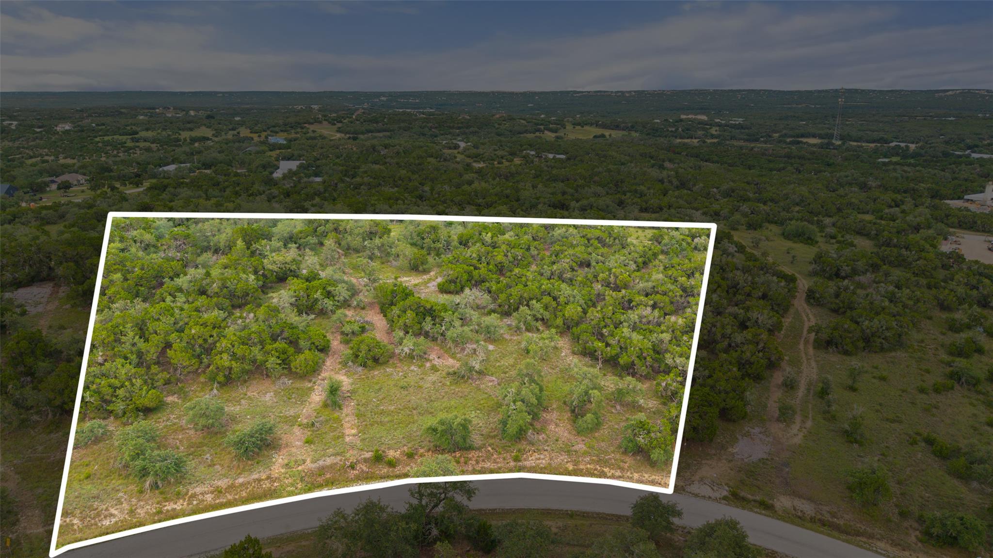 Vast, verdant acreage awaits your vision, nestled