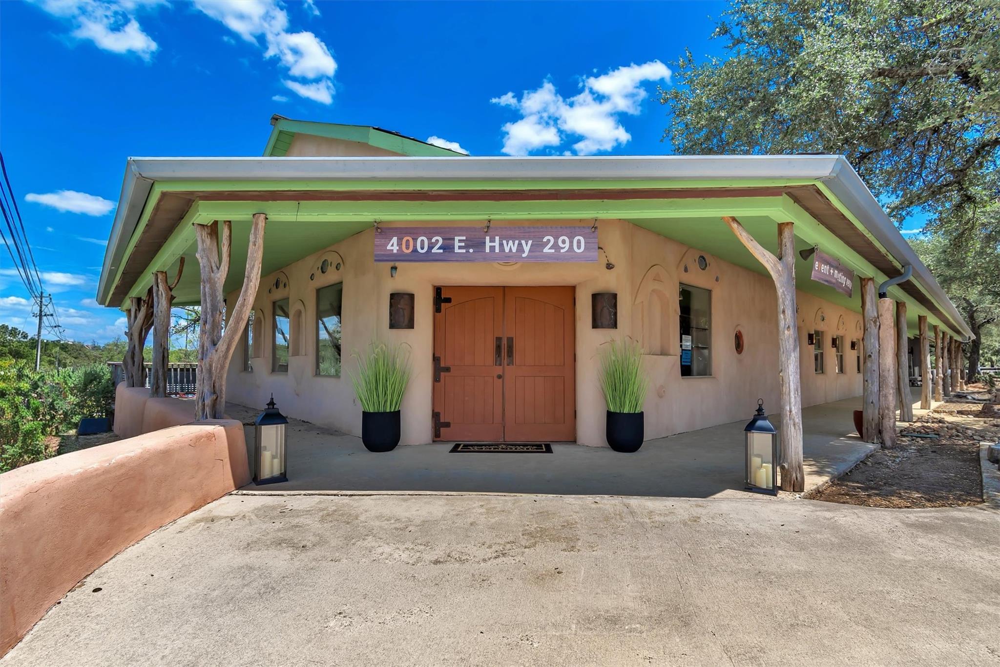 A welcoming front entrance features sturdy wooden