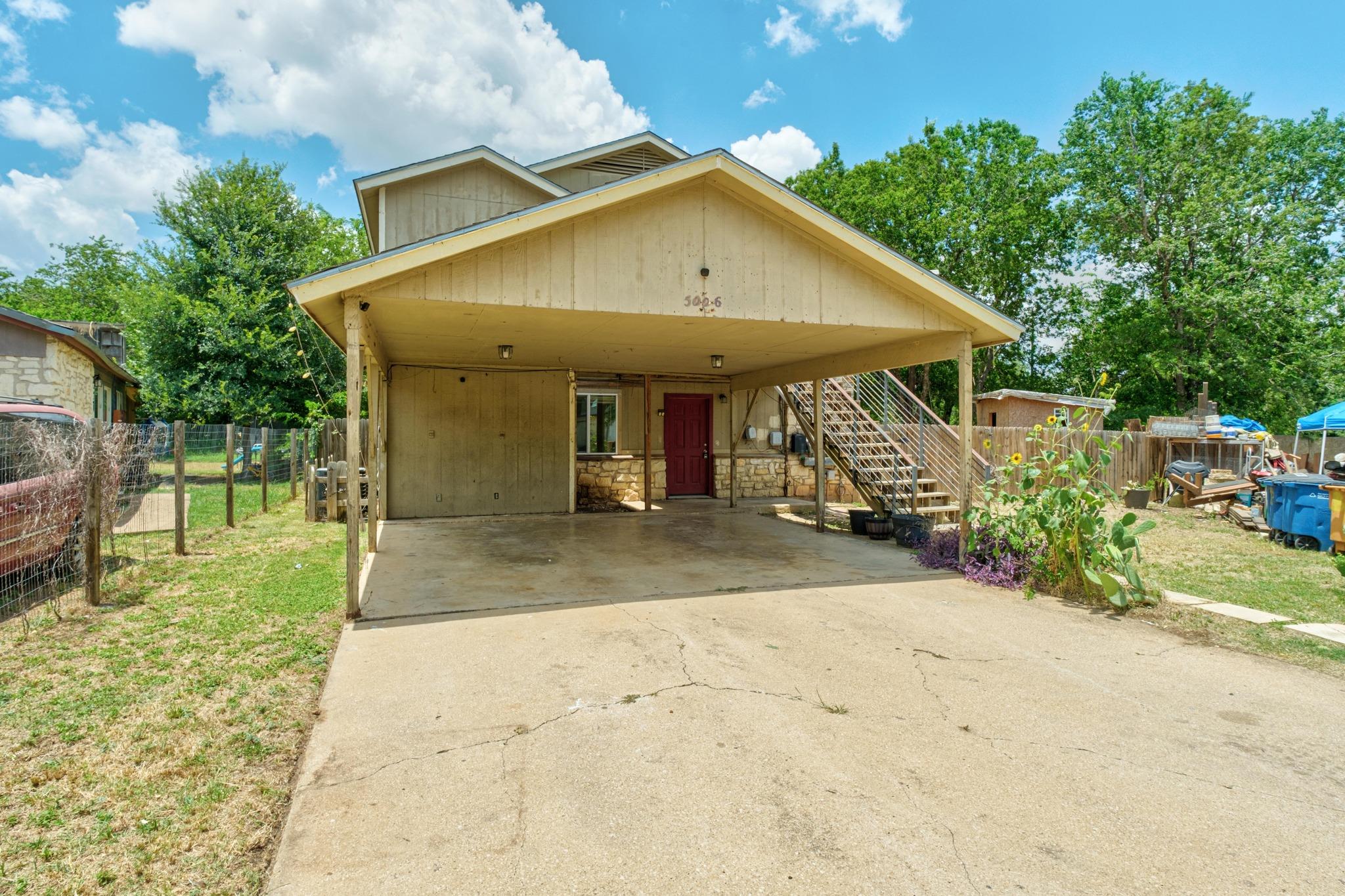 A well-maintained carport provides sheltered park