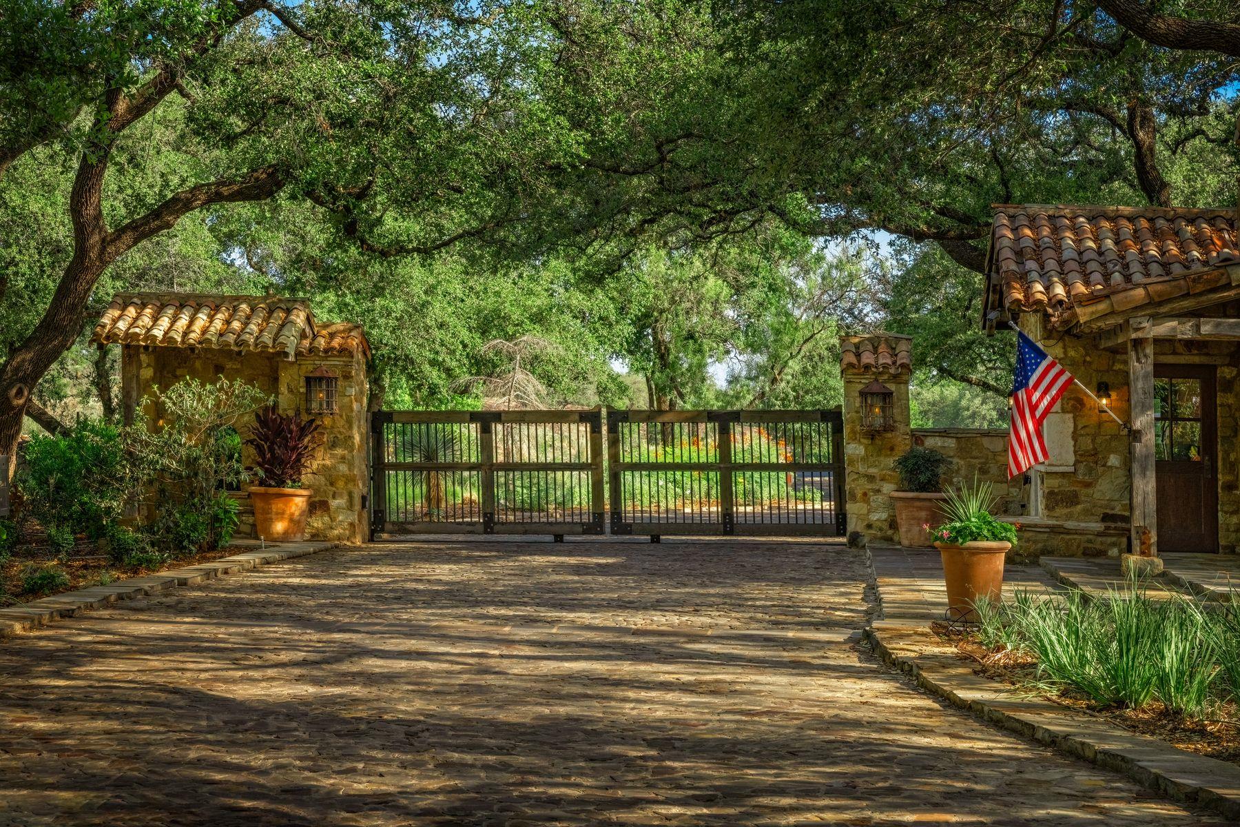 Secure, private entry with charming stone gatehou