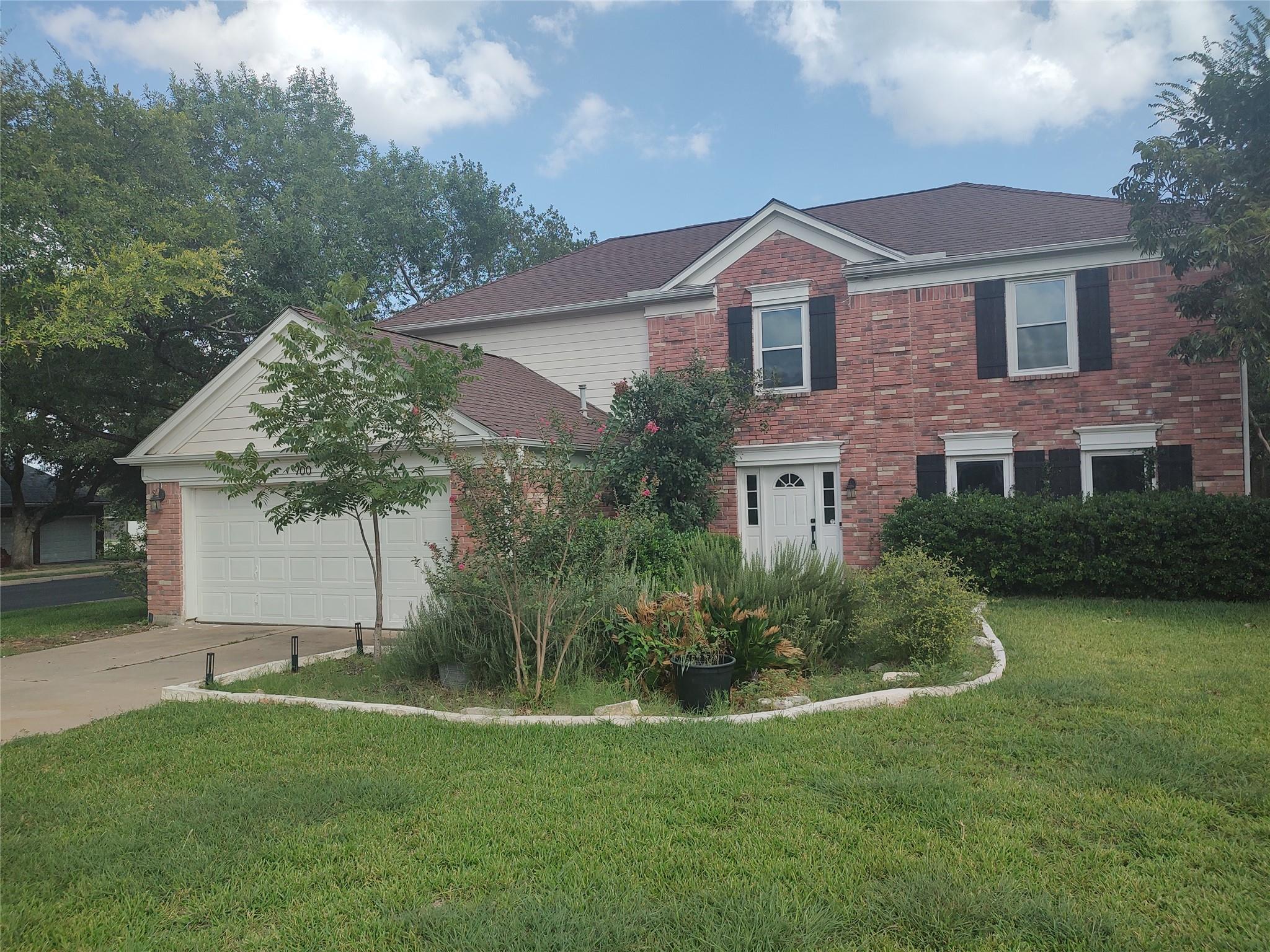 A classic brick exterior, complete with an attach