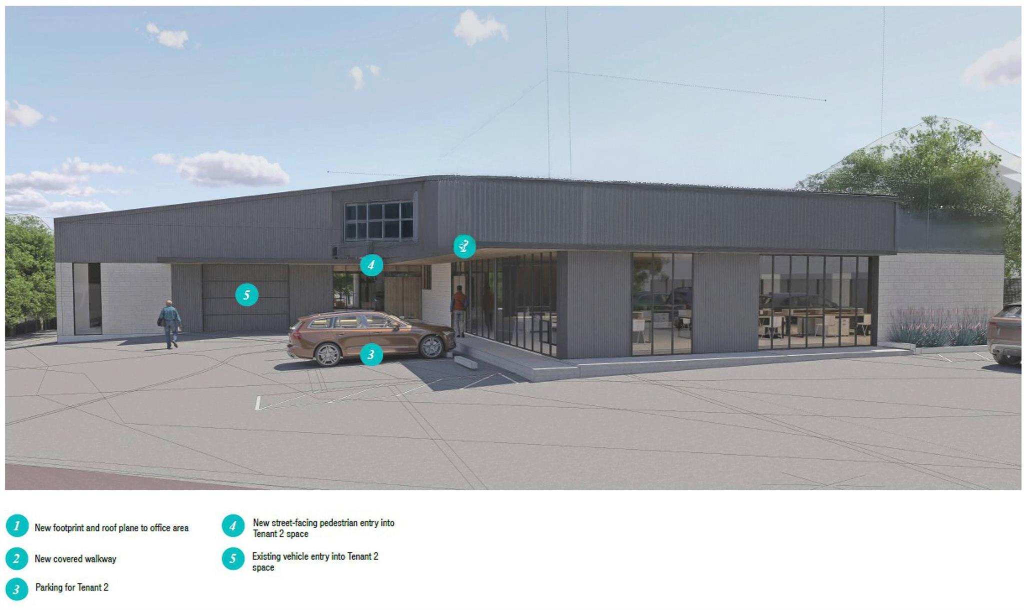 A modern commercial building offers ample parking