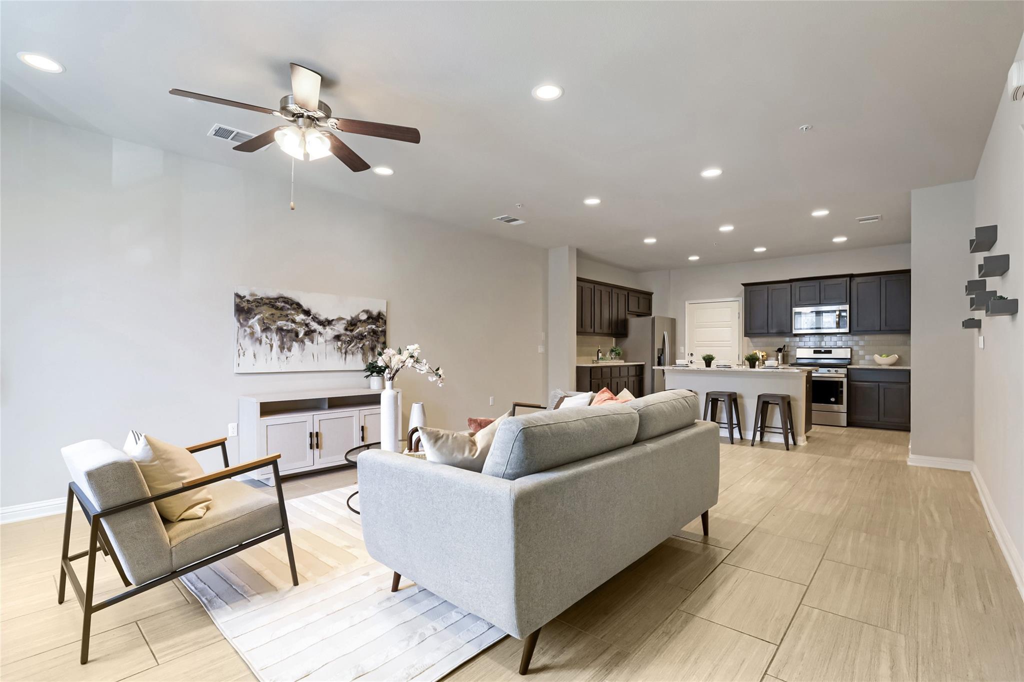 An open-concept layout unites the living area and