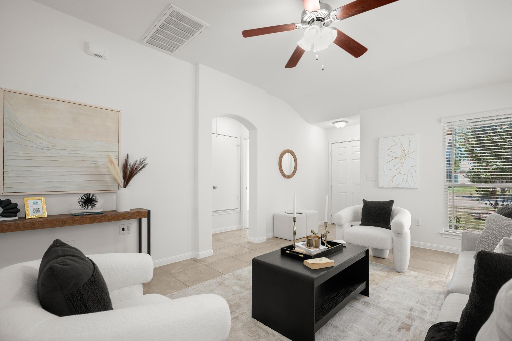 A living area with neutral tones provides a versa