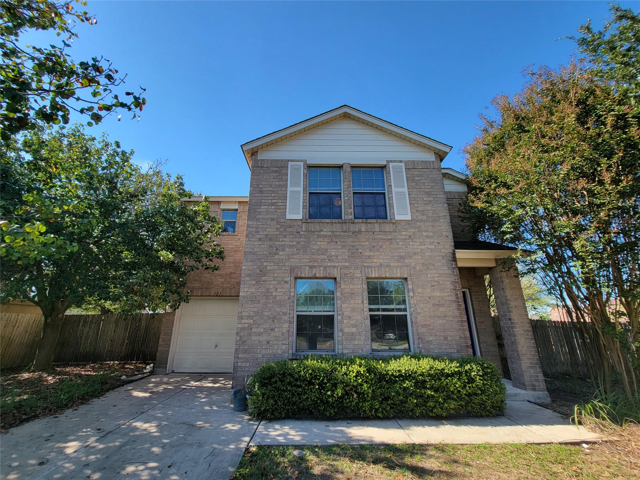 A classic brick exterior offers enduring appeal t