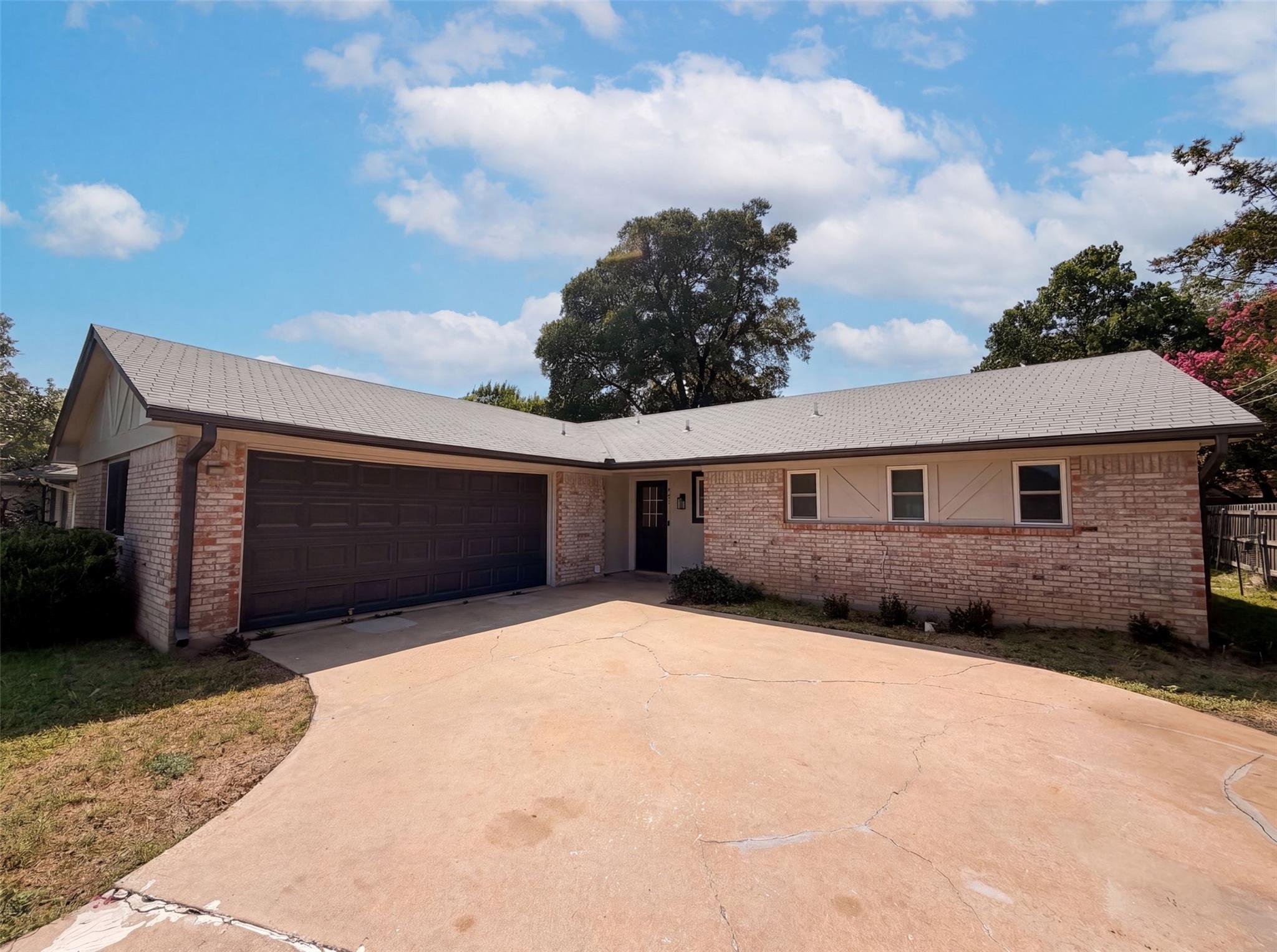 A well-maintained single-story home with an attac
