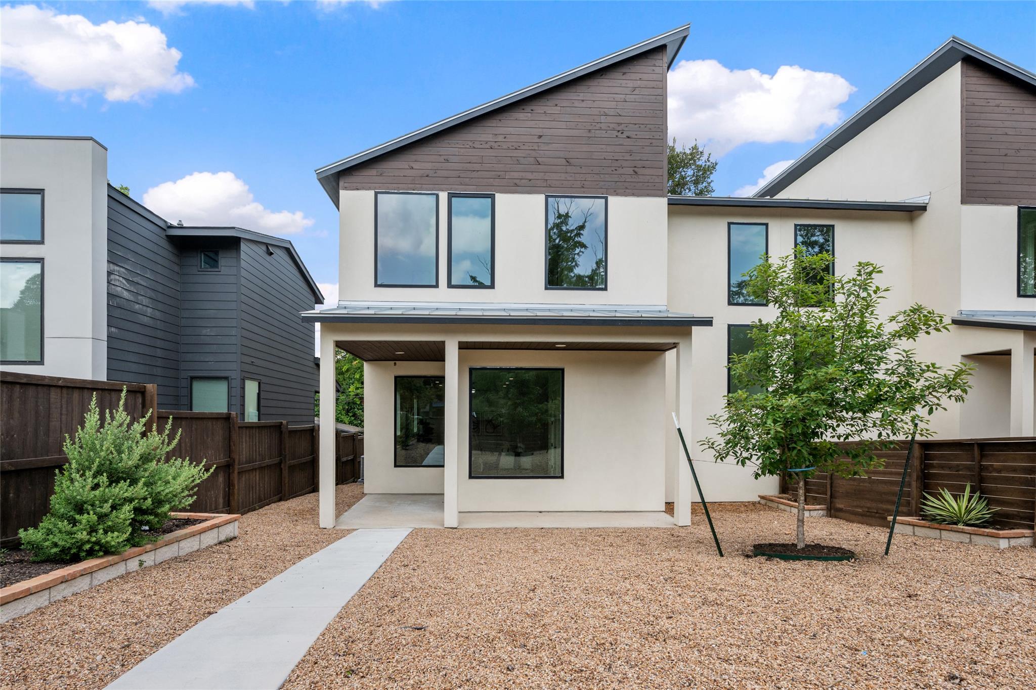 A striking modern facade with clean lines and con