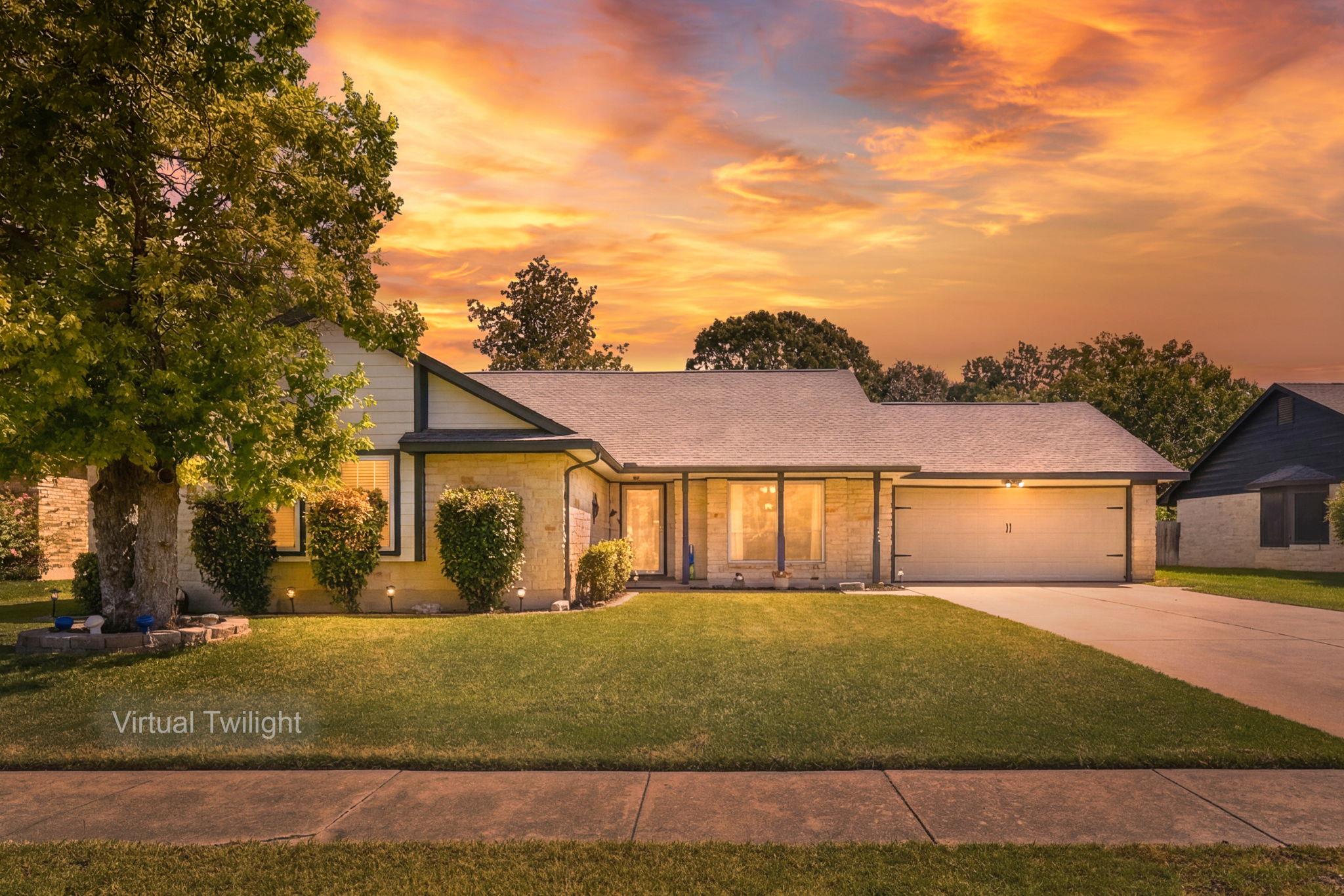 Golden hour illuminates this charming suburban re