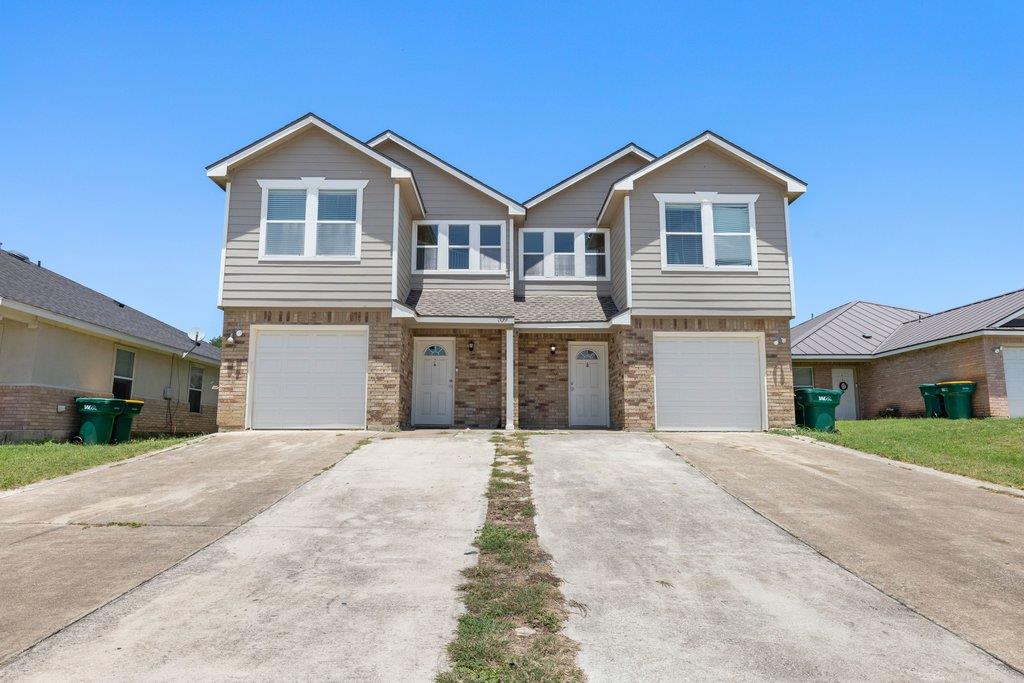 A well-maintained duplex residence presents a cla