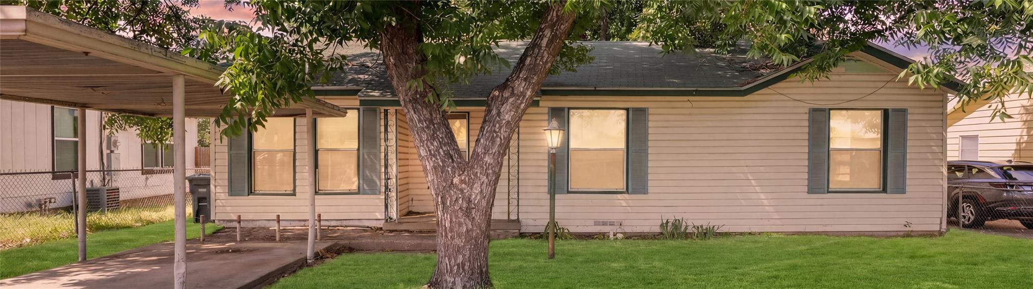 A classic front facade awaits, featuring a covere