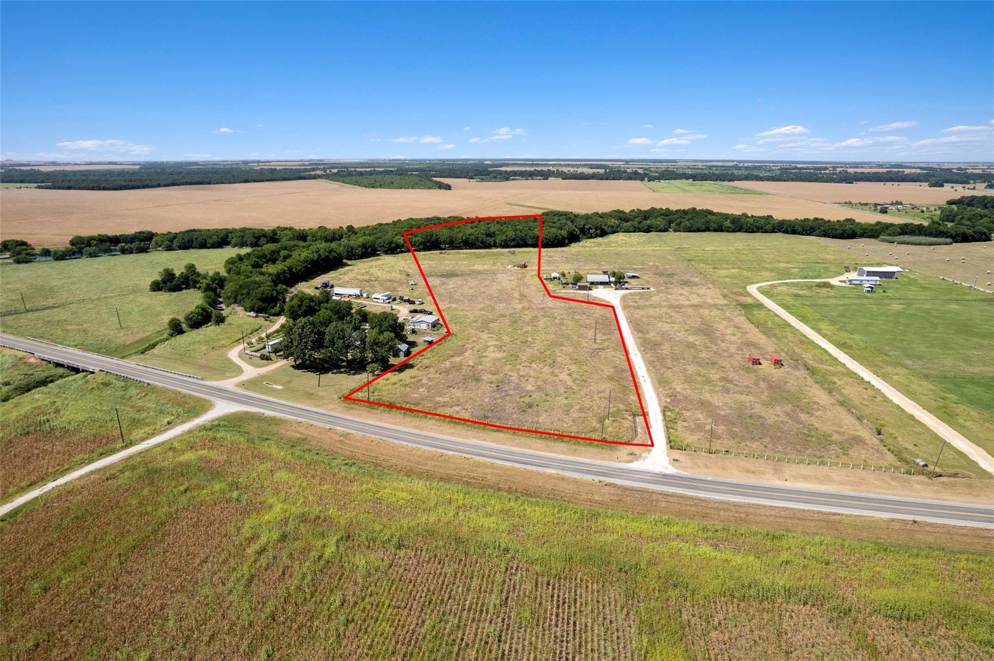 An aerial perspective reveals vast acreage with p