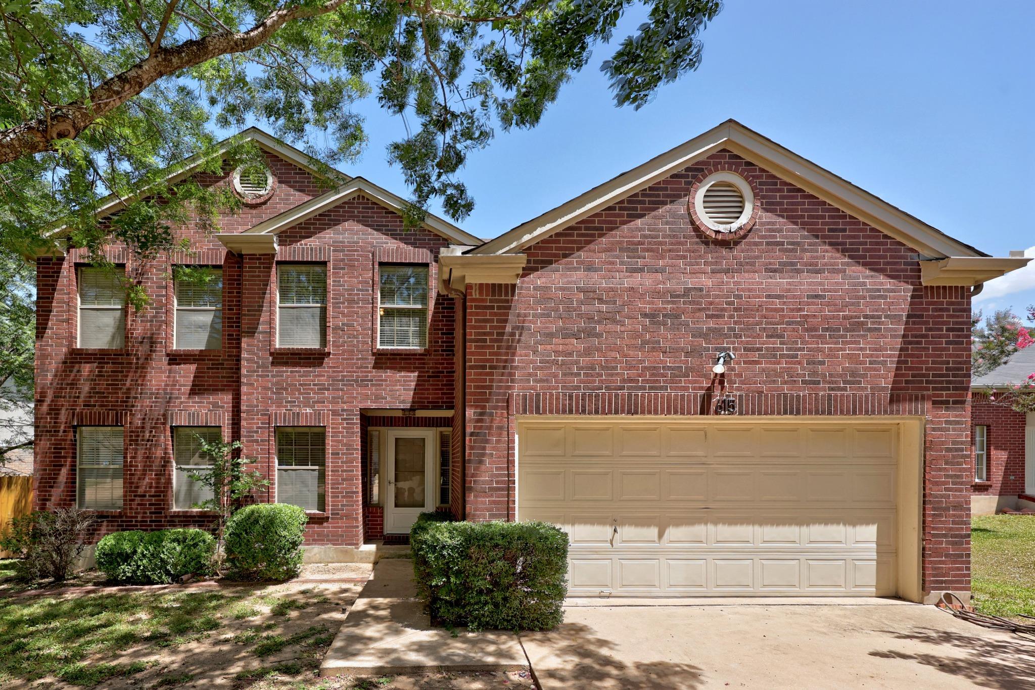 A classic brick exterior graces this welcoming re