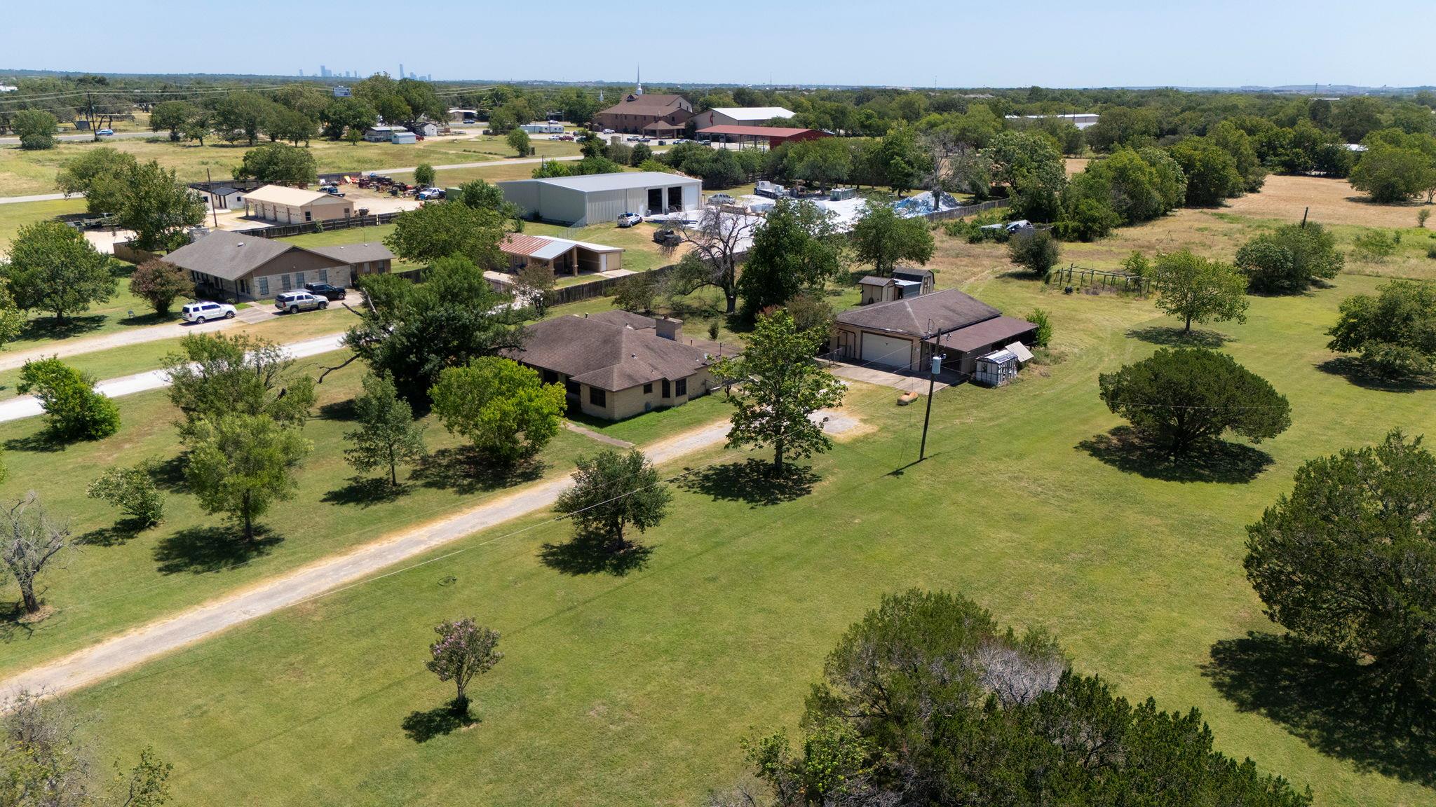 An aerial perspective reveals sprawling green acr