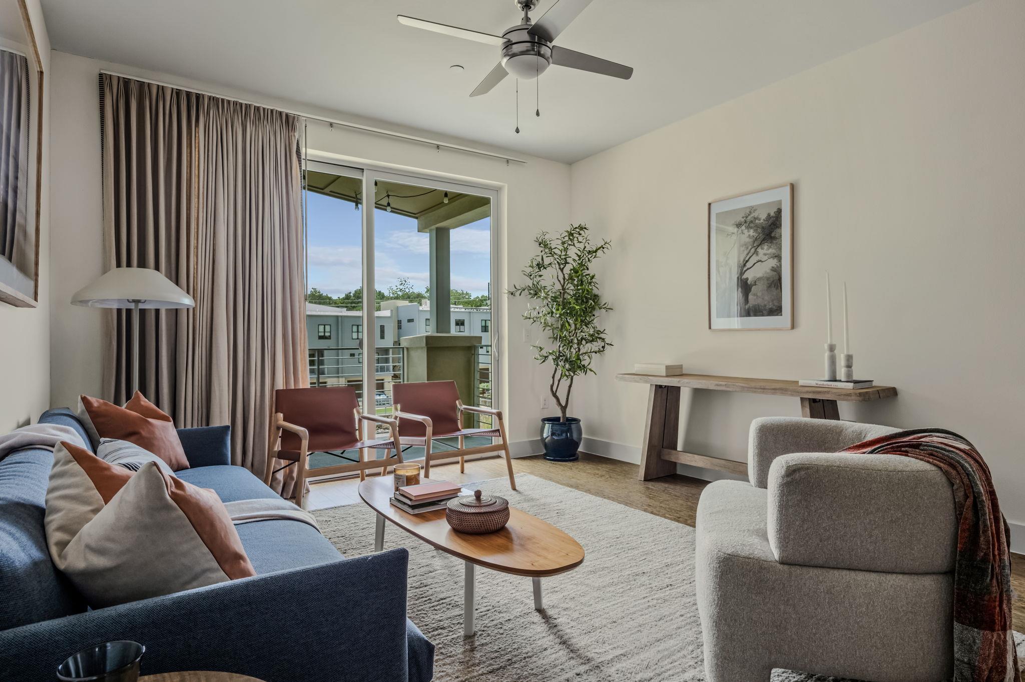 Natural light floods this inviting living space w