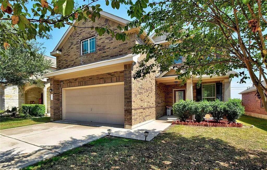 A classic brick exterior offers enduring charm an