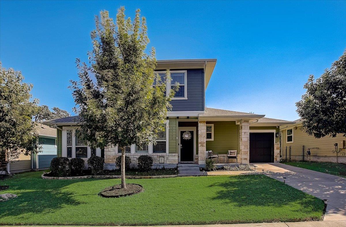 A welcoming front exterior showcasing mature land