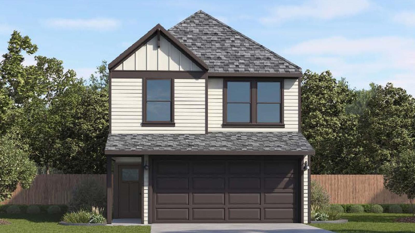 A classic two-story home features a functional ga