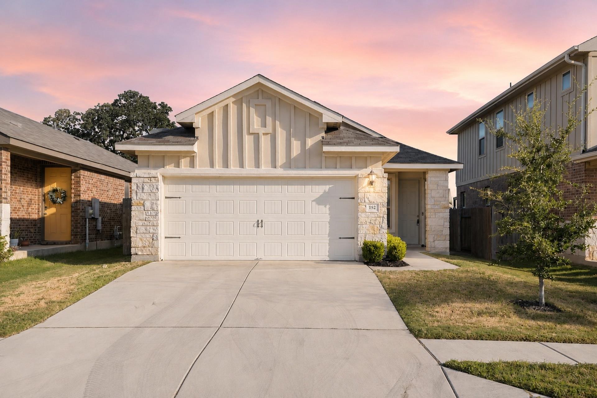Board and batten siding pairs with natural stone 