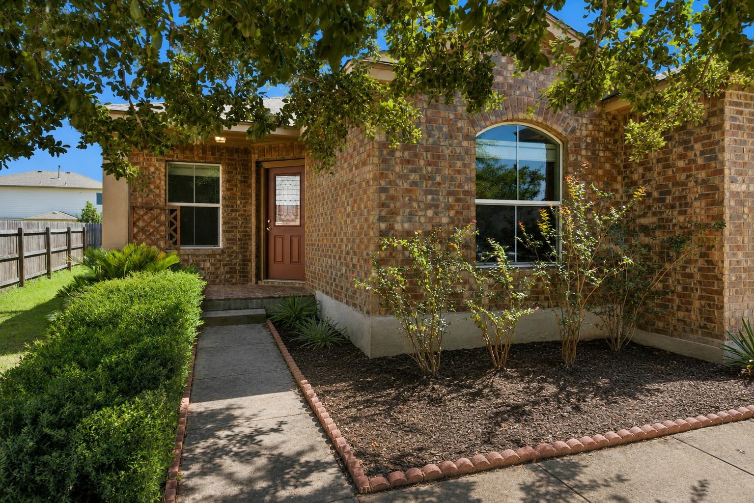 A classic brick exterior welcomes you home, frame