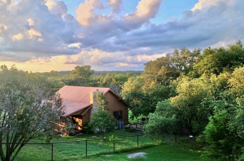 Perched on a verdant hillside, this tranquil dwel