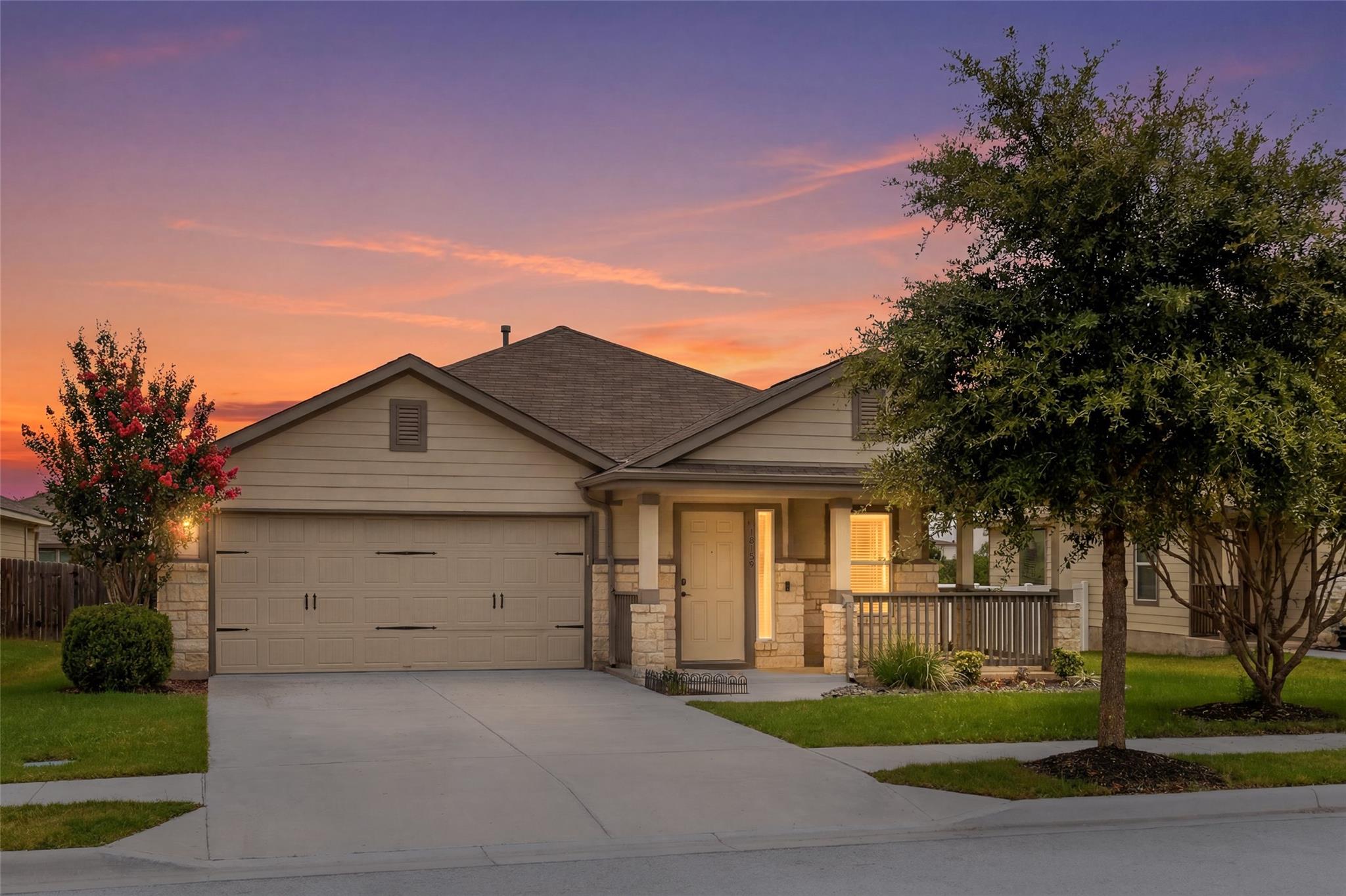 Stone and siding exterior creates inviting curb a
