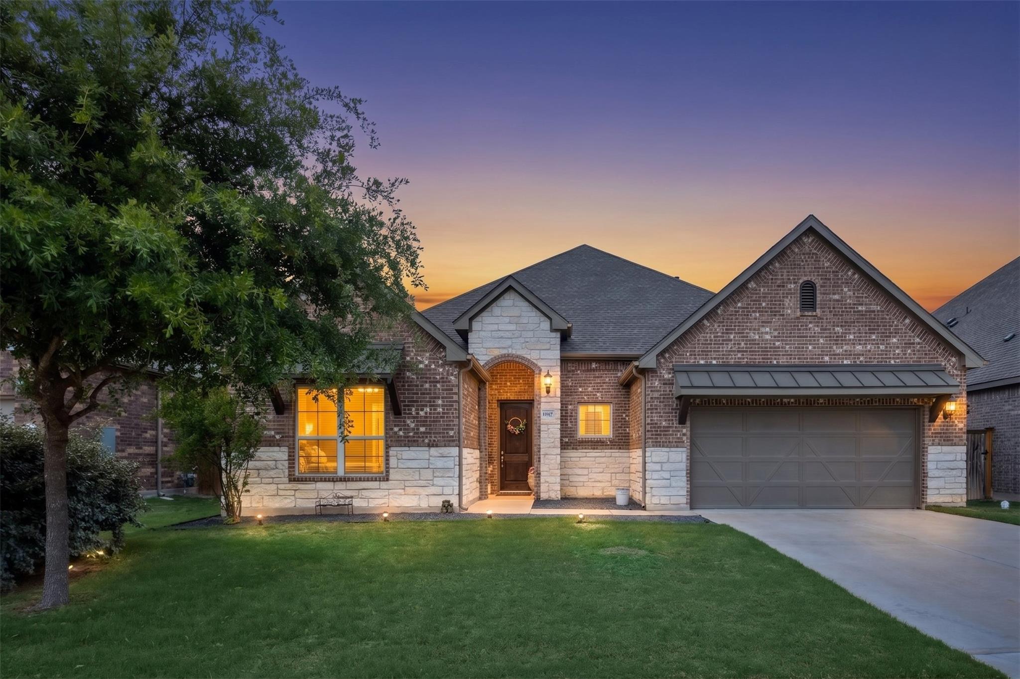 A welcoming façade with brick and stone accents, 