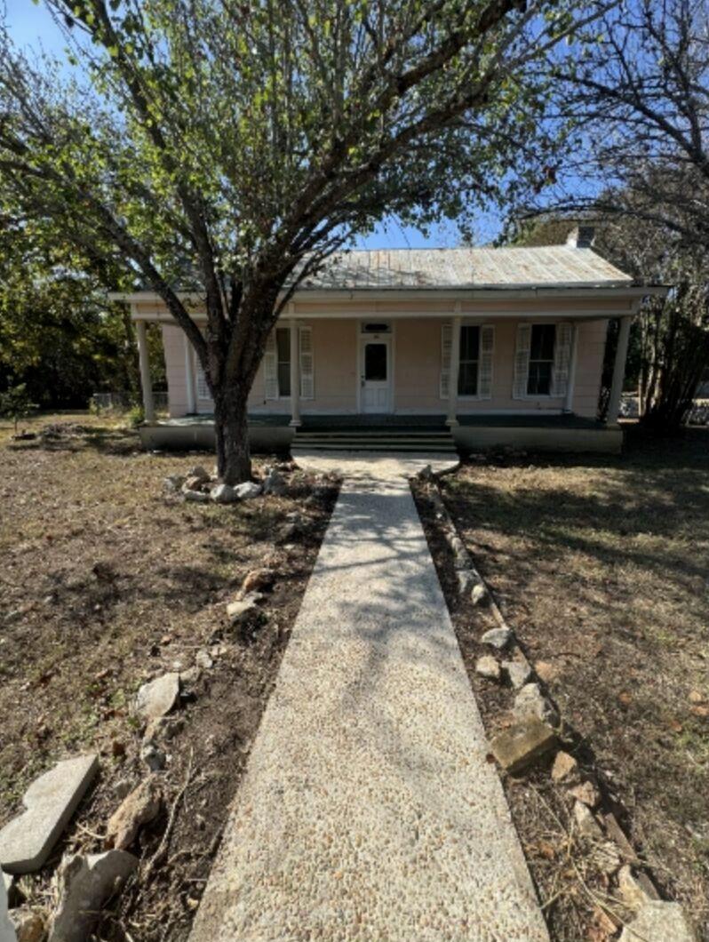 View of front of property featuring a porch