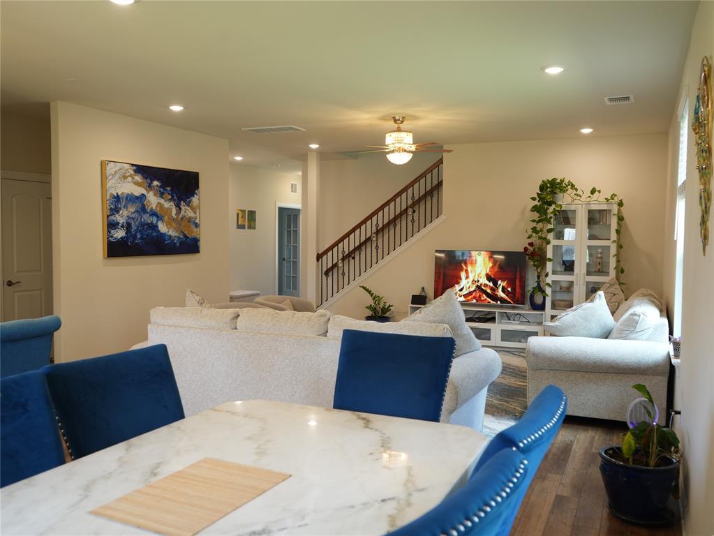An inviting gathering space with hardwood floorin