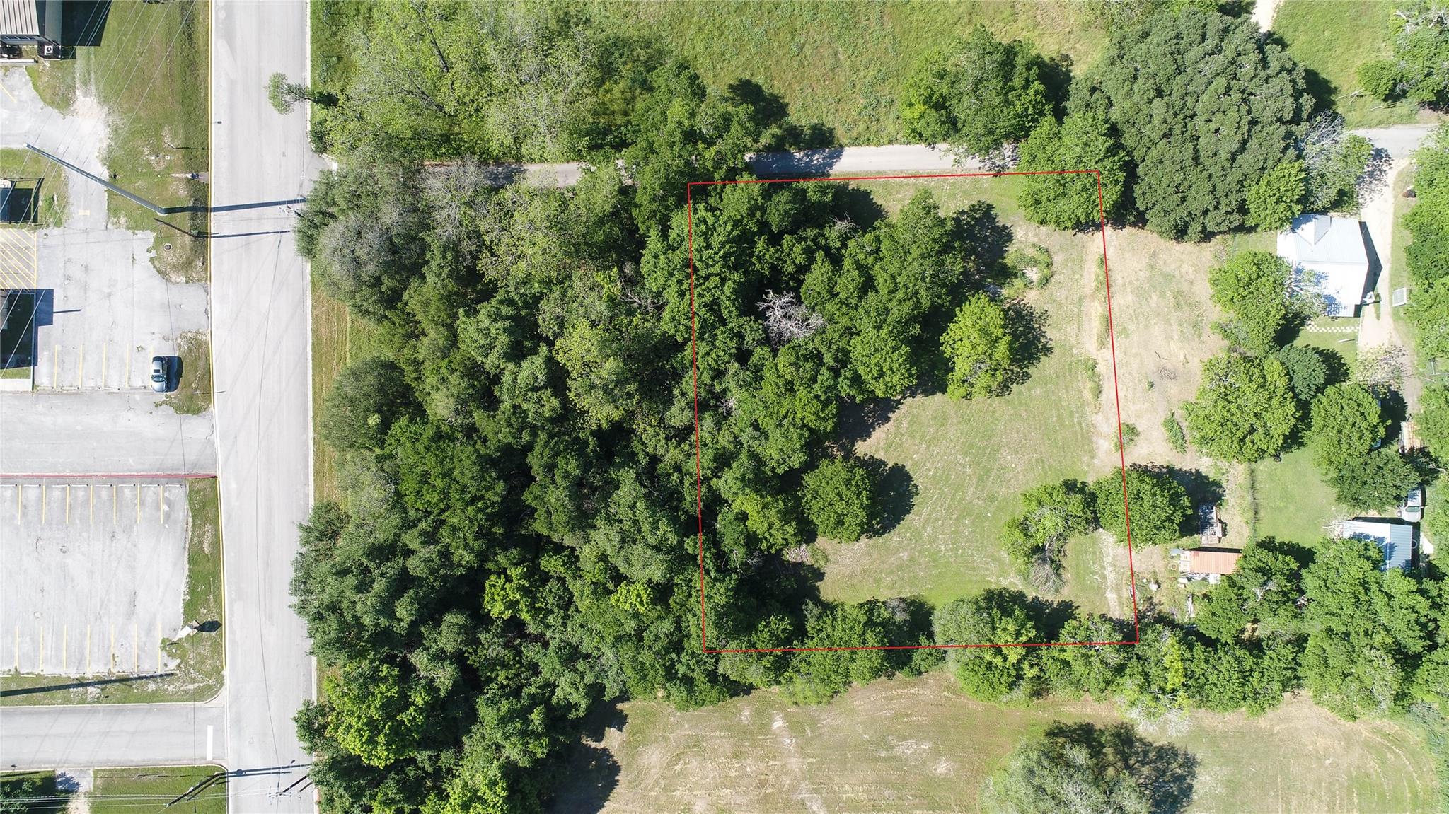 Discover a tranquil lot with natural tree coverag