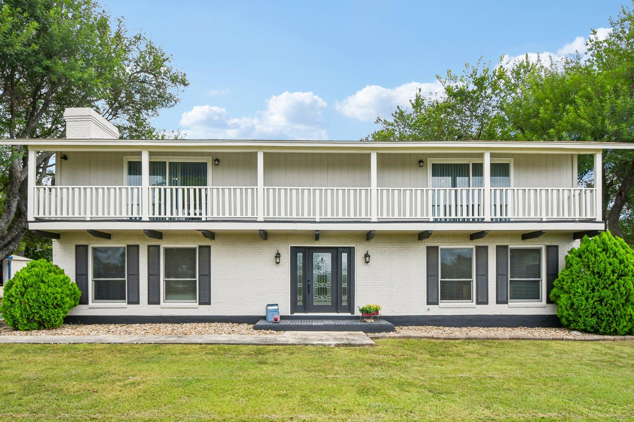 A classic two-story facade with a welcoming front