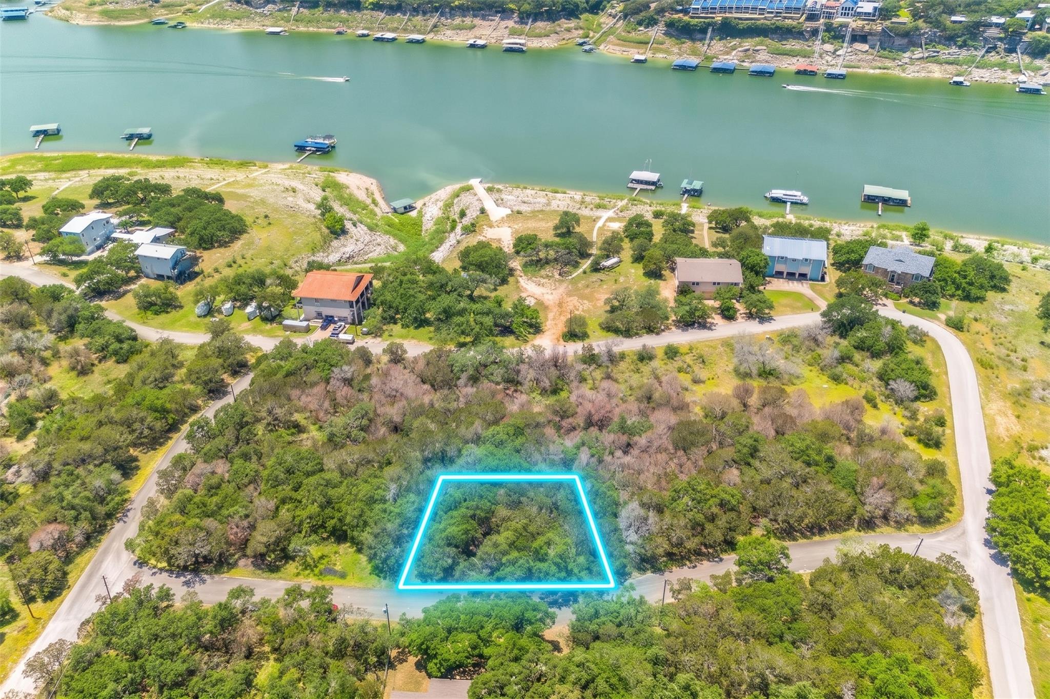 Perched above the lake, this property offers sere