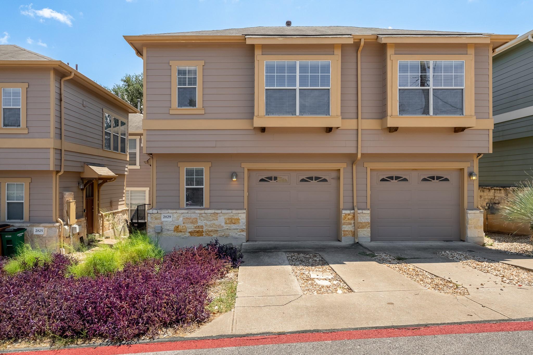 A well-maintained two-story residence presents a 