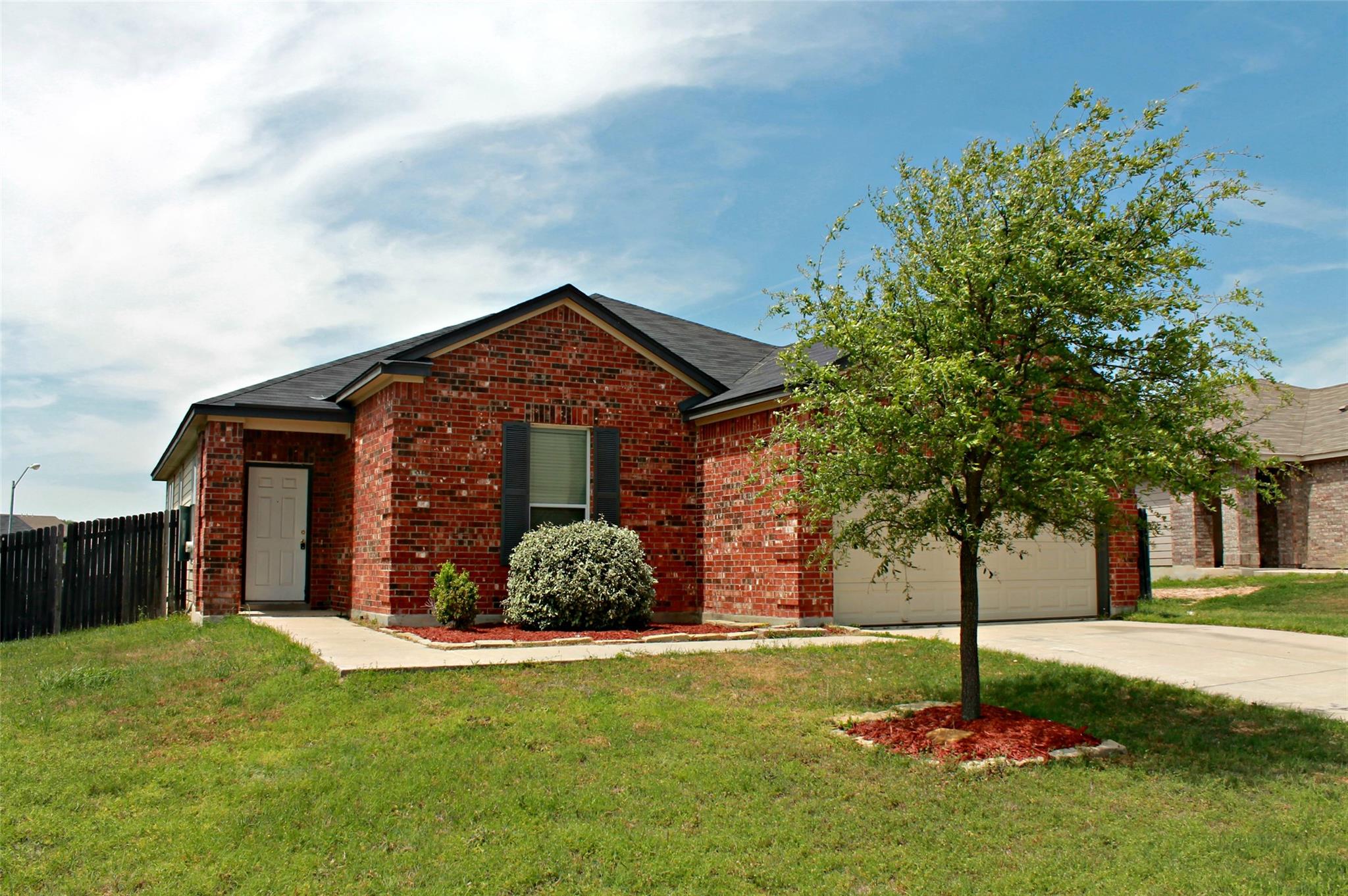 A classic brick exterior offers timeless curb app