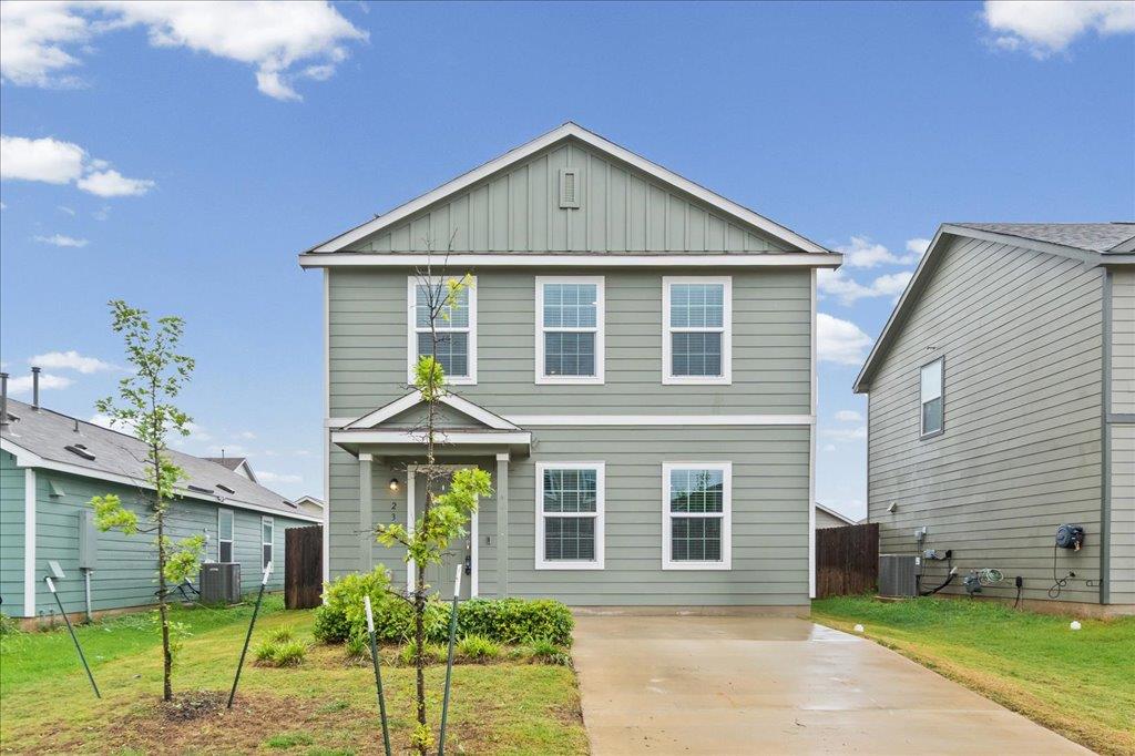 A welcoming front porch leads into this charming 