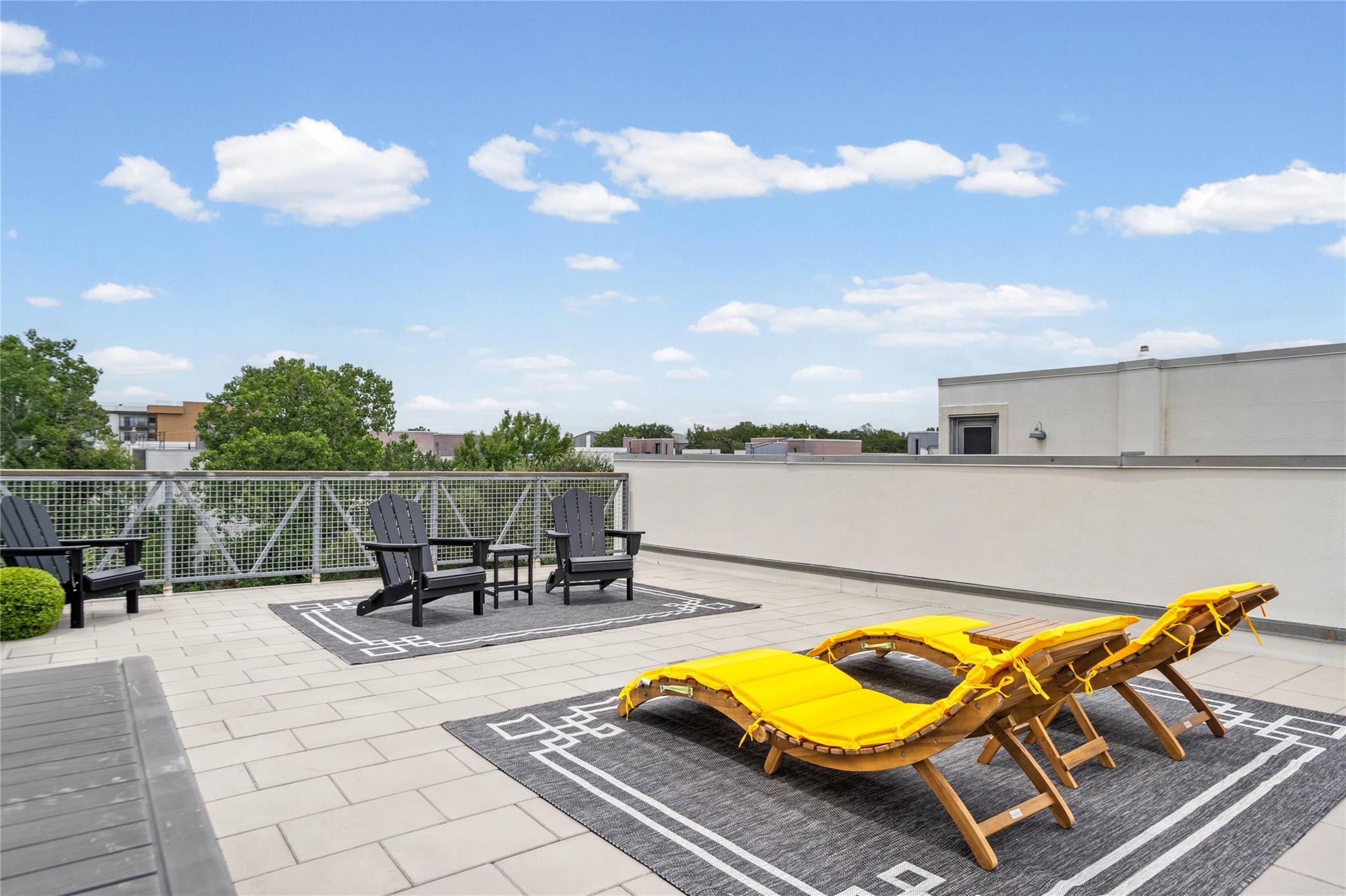 A spacious rooftop terrace provides an elevated o