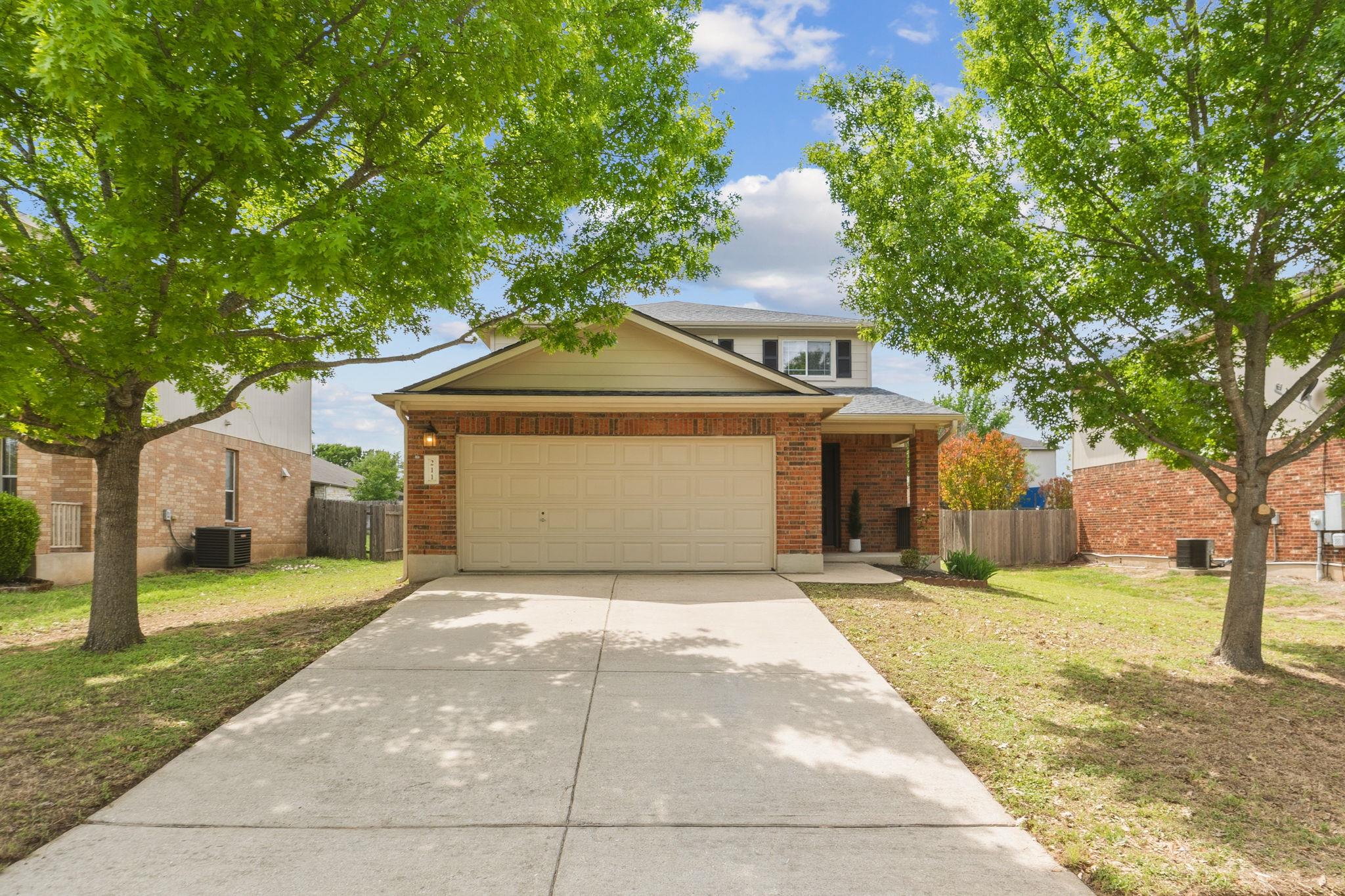 A classic brick exterior with a welcoming covered