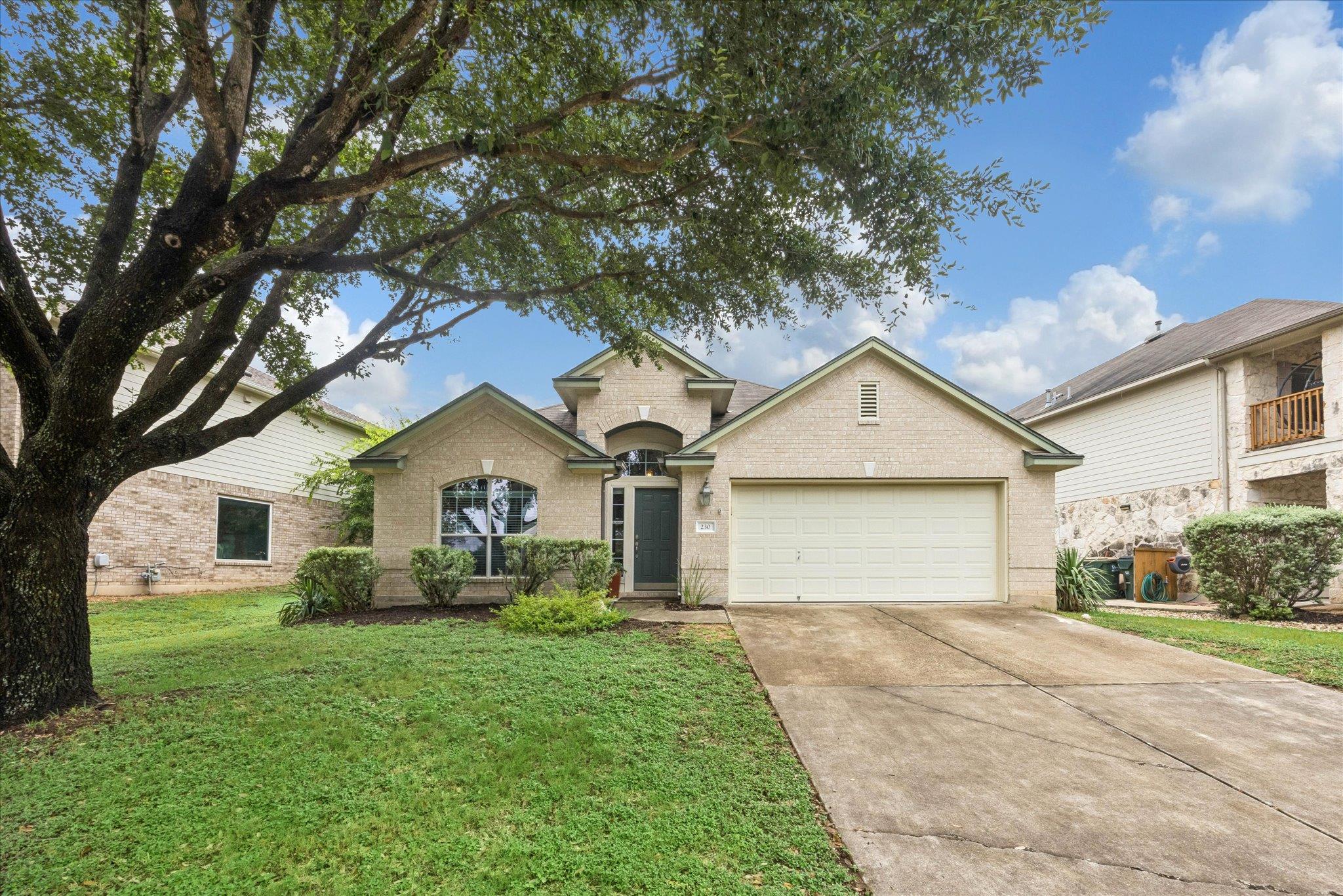 A well-maintained single-story home with a two-ca
