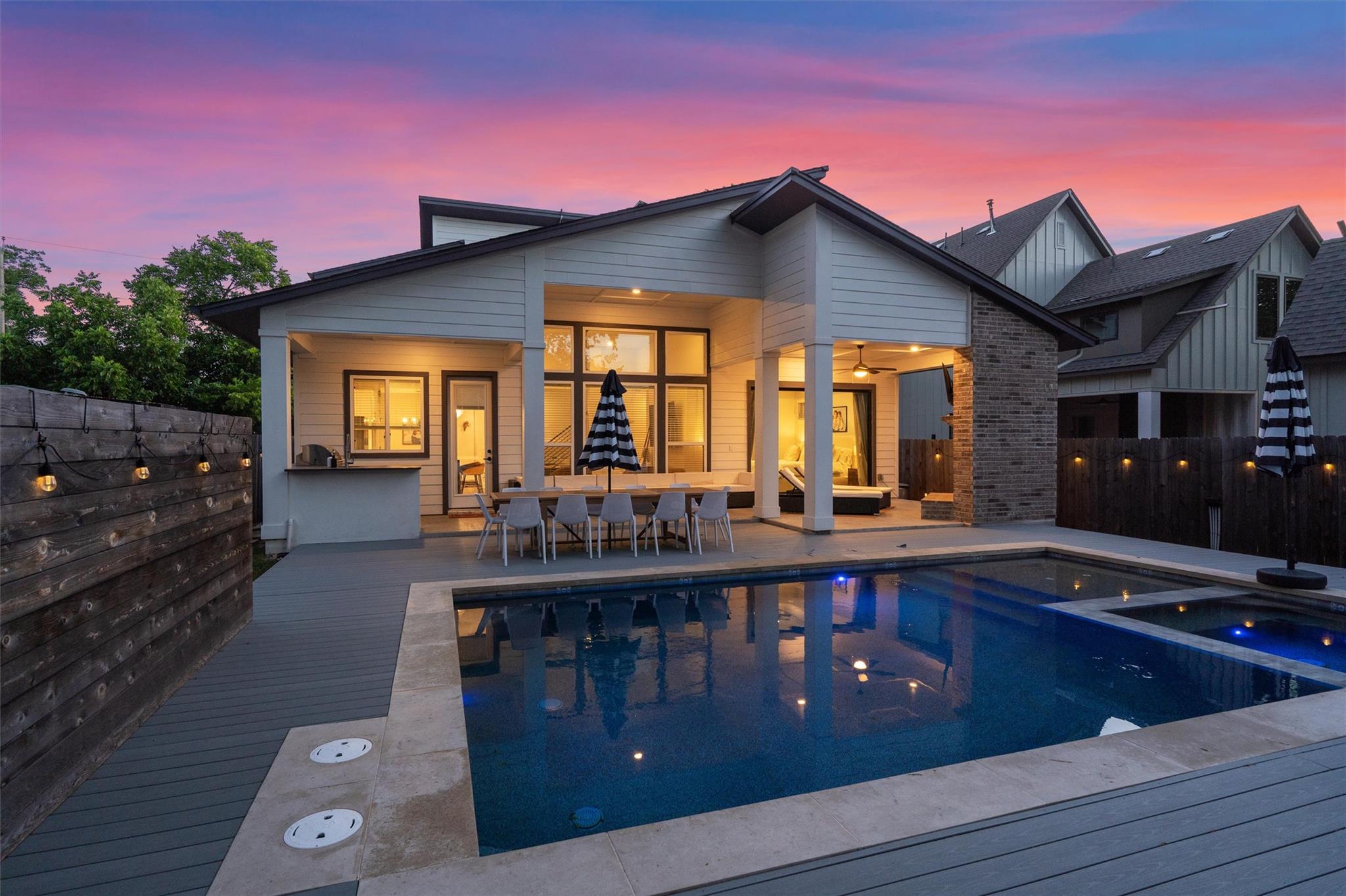 An inviting outdoor oasis with a sleek pool and a