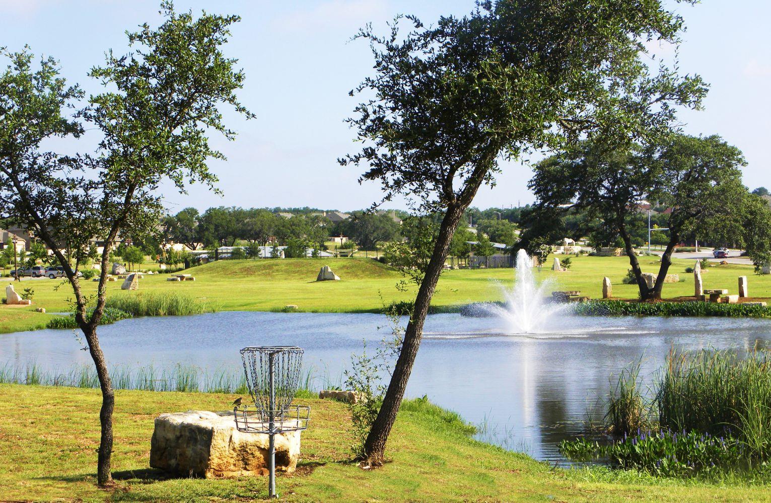 A tranquil pond with a decorative fountain create